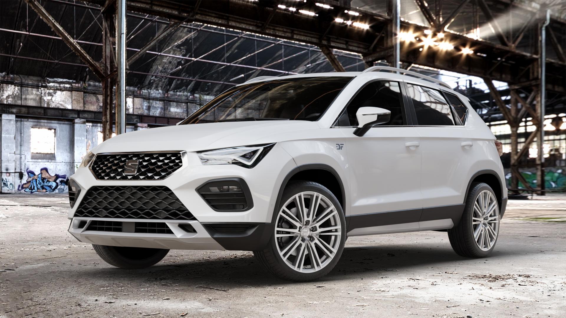 2DRV WH18 Daytona Grau Hochglanzpoliert Felge mit Reifen silber mehrfarbig in 19Zoll Winterfelge Alufelge auf weissem Seat Ateca Typ 5FP Facelift ⬇️ mit 15mm Tieferlegung ⬇️ Old Industrial Hall_max_4400mm_2024 Frontansicht_1