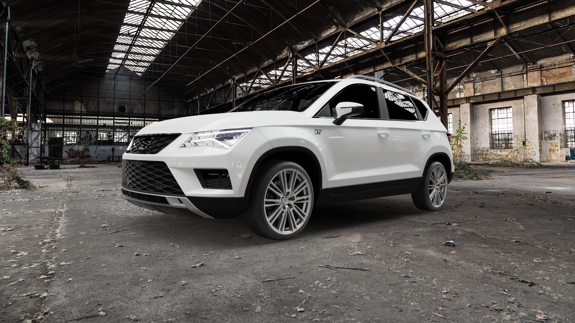 2DRV WH18 Daytona Grau Hochglanzpoliert Felge mit Reifen silber mehrfarbig in 19Zoll Winterfelge Alufelge auf weissem Seat Ateca Typ 5FP X-Perience ⬇️ mit 15mm Tieferlegung ⬇️ Old Industrial Hall_max5000mm_2022 Frontansicht_1