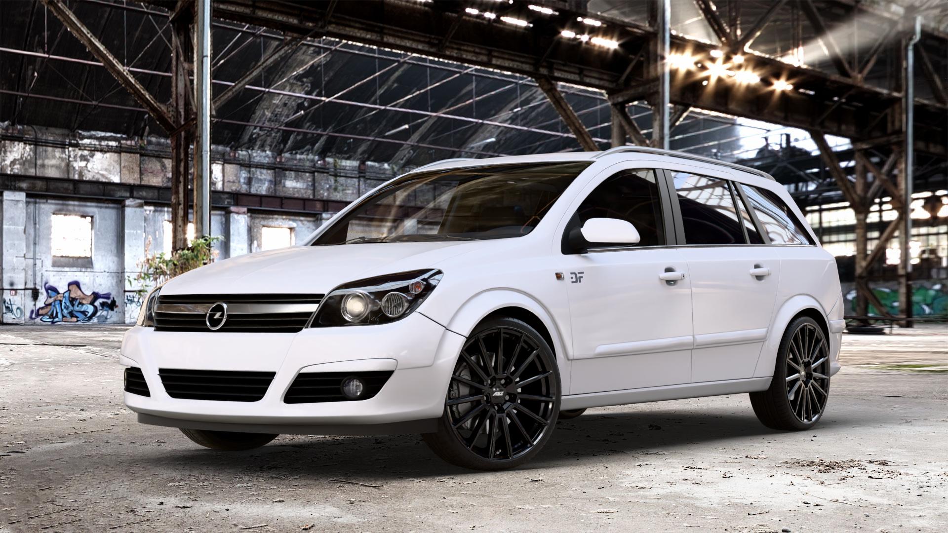 AEZ ATLANTA BLACK Felge mit Reifen schwarz in 19Zoll Winterfelge Alufelge auf weissem Opel Astra H Typ A-H Caravan A-H/SW ⬇️ mit 15mm Tieferlegung ⬇️ Old Industrial Hall_max_4400mm_2024 Frontansicht_1