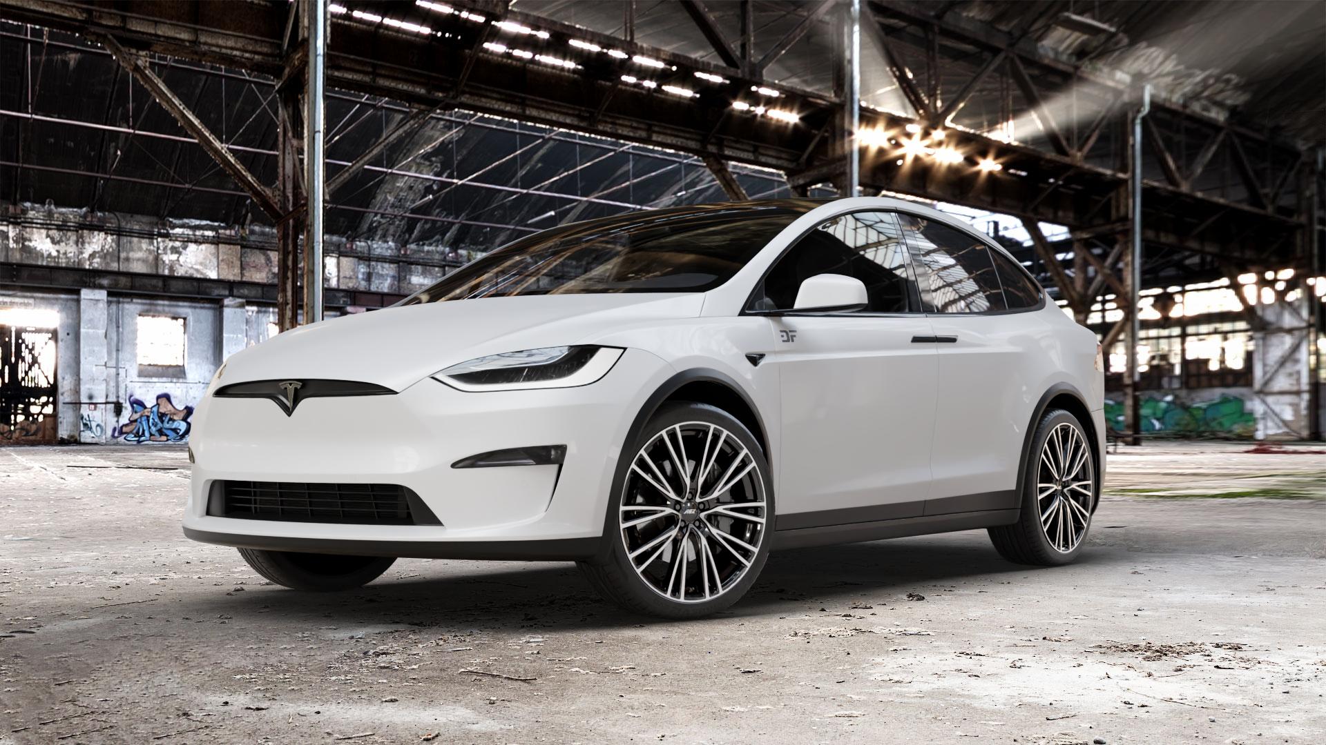 AEZ SEATTLE BLACK/POLISHED Felge mit Reifen schwarz in 22Zoll Winterfelge Alufelge auf weissem Tesla Model X Typ 004 ⬇️ mit 15mm Tieferlegung ⬇️ Old Industrial Hall_max_5300mm_2024 Frontansicht_1