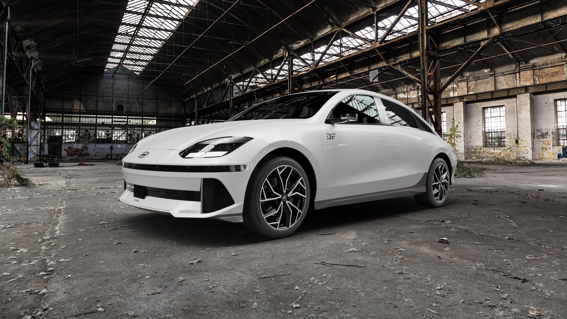ALUTEC ADX.02 diamant-schwarz frontpoliert Felge mit Reifen silber in 19Zoll Winterfelge Alufelge auf weissem Hyundai Ioniq 6 Typ CE ⬇️ mit 15mm Tieferlegung ⬇️ Old Industrial Hall_max5000mm_2022 Frontansicht_1