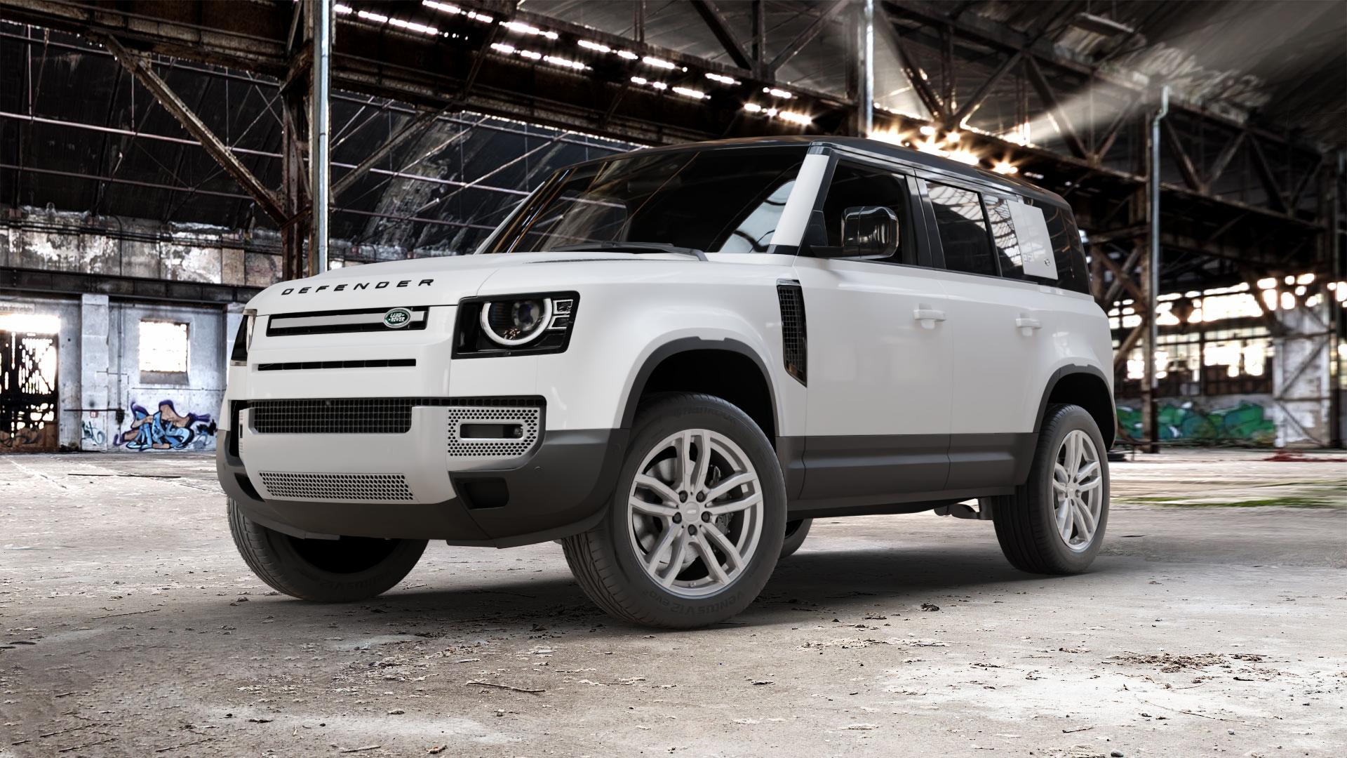 ALUTEC DriveX metal-grey Felge mit Reifen grau in 20Zoll Winterfelge Alufelge auf weissem Land Rover Defender 110 Typ LE ⬇️ mit 15mm Tieferlegung ⬇️ Old Industrial Hall_max_5300mm_2024 Frontansicht_1