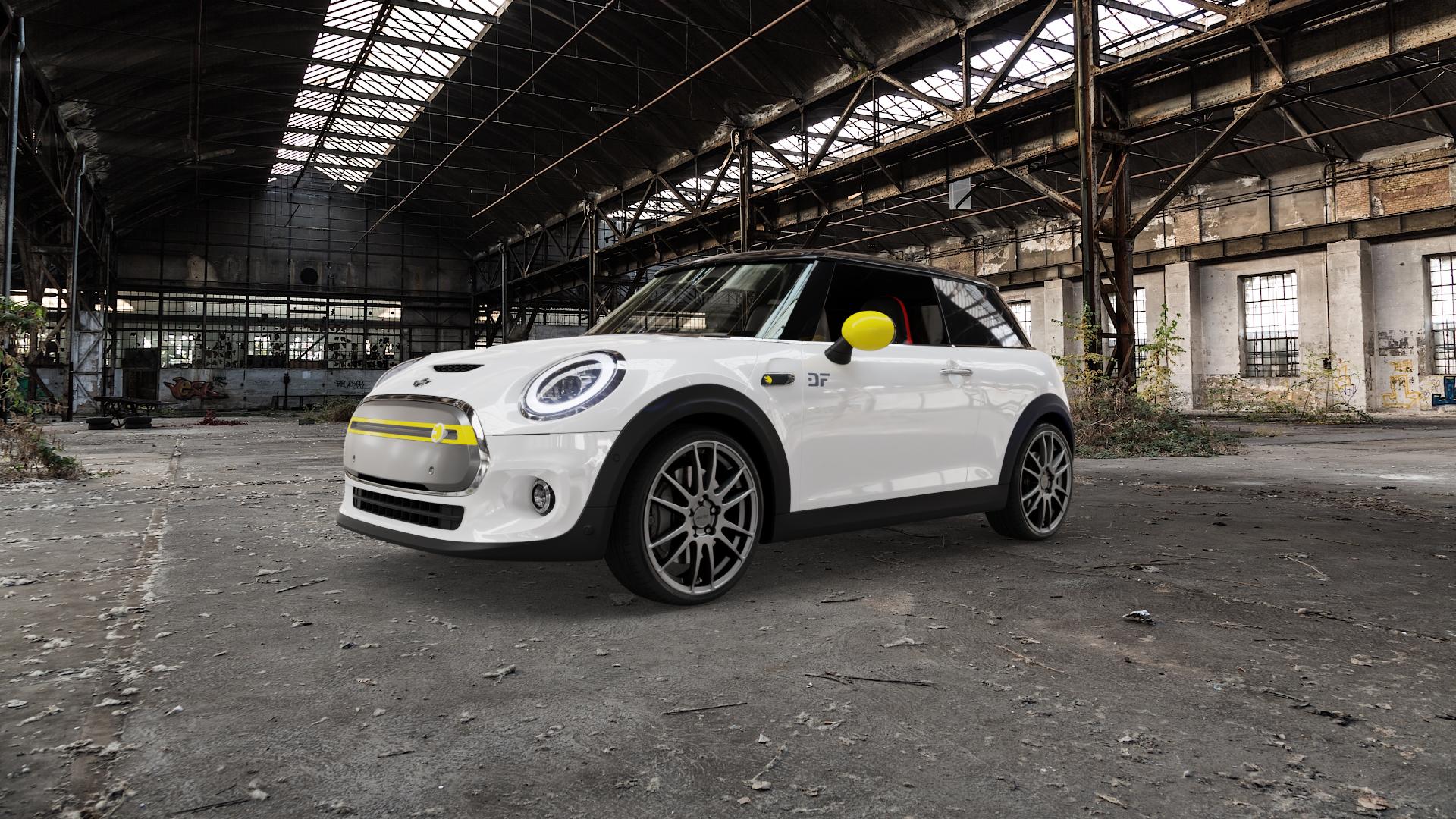 ALUTEC Monstr carbon-grey Felge mit Reifen grau in 18Zoll Winterfelge Alufelge auf weissem Mini F56 Typ FML2E (3-Türer Limousine) 0,0l Cooper SE 75kW (102 PS) ⬇️ mit 15mm Tieferlegung ⬇️ Old Industrial Hall_max5000mm_2022 Frontansicht_1