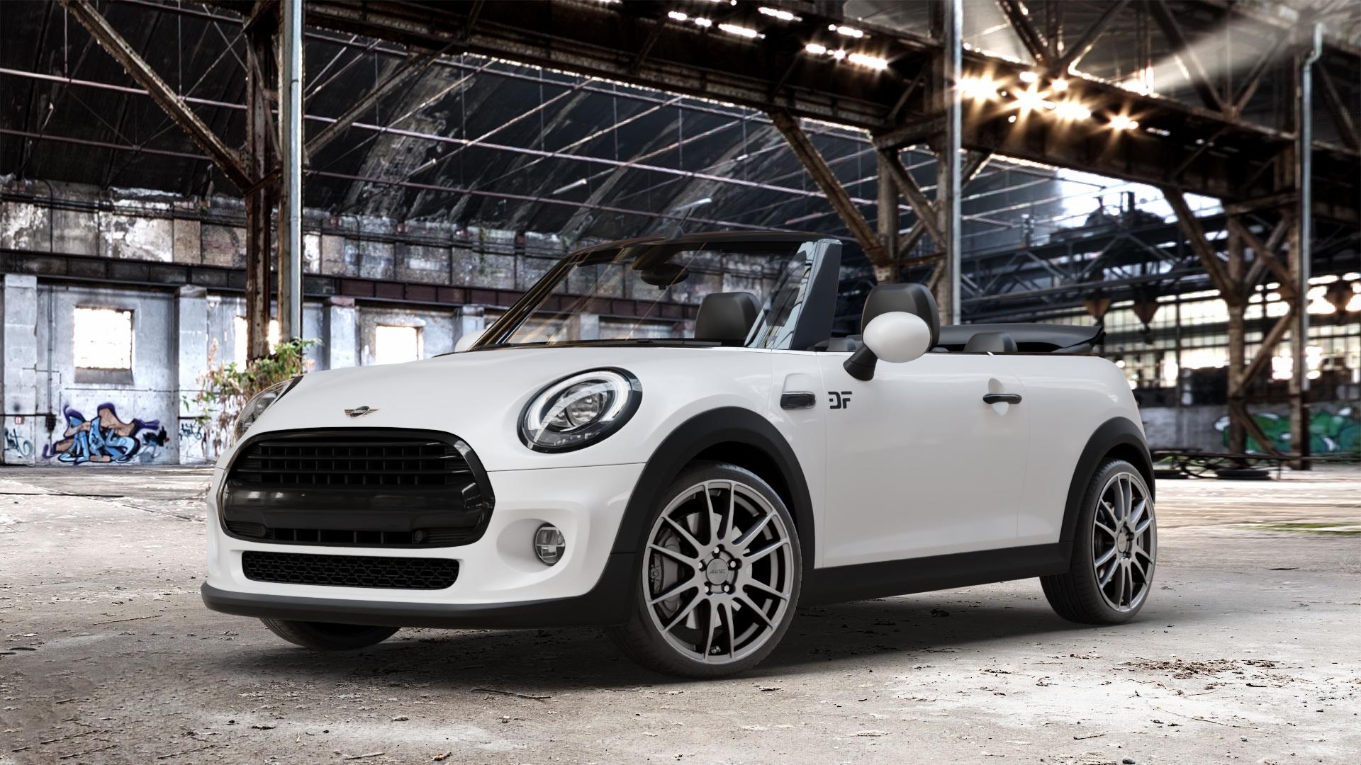 ALUTEC Monstr carbon-grey Felge mit Reifen grau in 18Zoll Winterfelge Alufelge auf weissem Mini F57 Typ UKL-L (Cabriolet) 1,5l Cooper 100kW (136 PS) D 85kW (116 1,2l One 75kW (102 FMCA Facelift ⬇️ mit 15mm Tieferlegung ⬇️ Old Industrial Hall_max_4400mm_2024 Frontansicht_1
