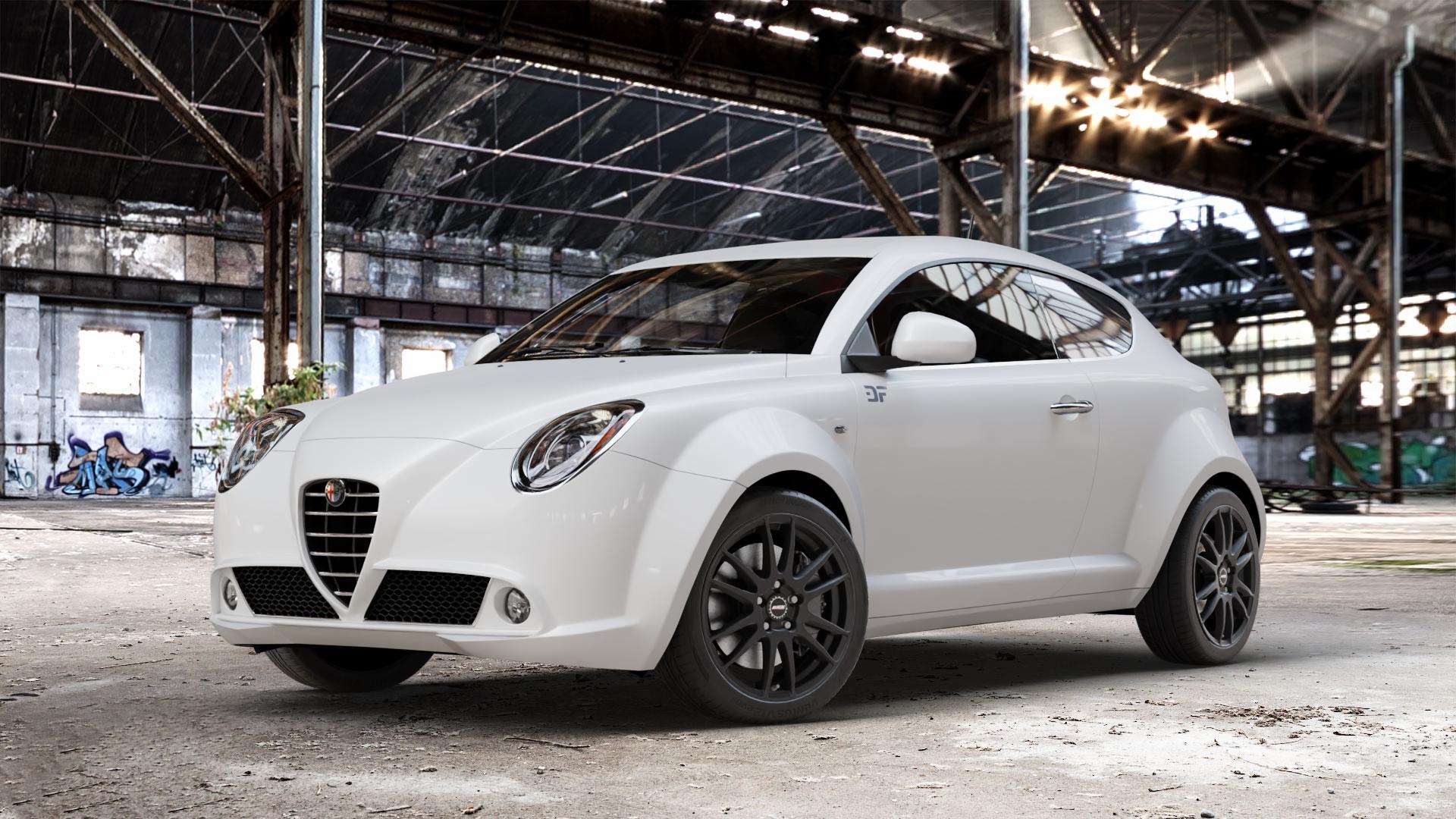 ALUTEC Monstr racing-schwarz Felge mit Reifen in 17Zoll Winterfelge Alufelge auf weissem Alfa Romeo Mito Typ 955 ⬇️ mit 15mm Tieferlegung ⬇️ Old Industrial Hall_max_4400mm_2024 Frontansicht_1