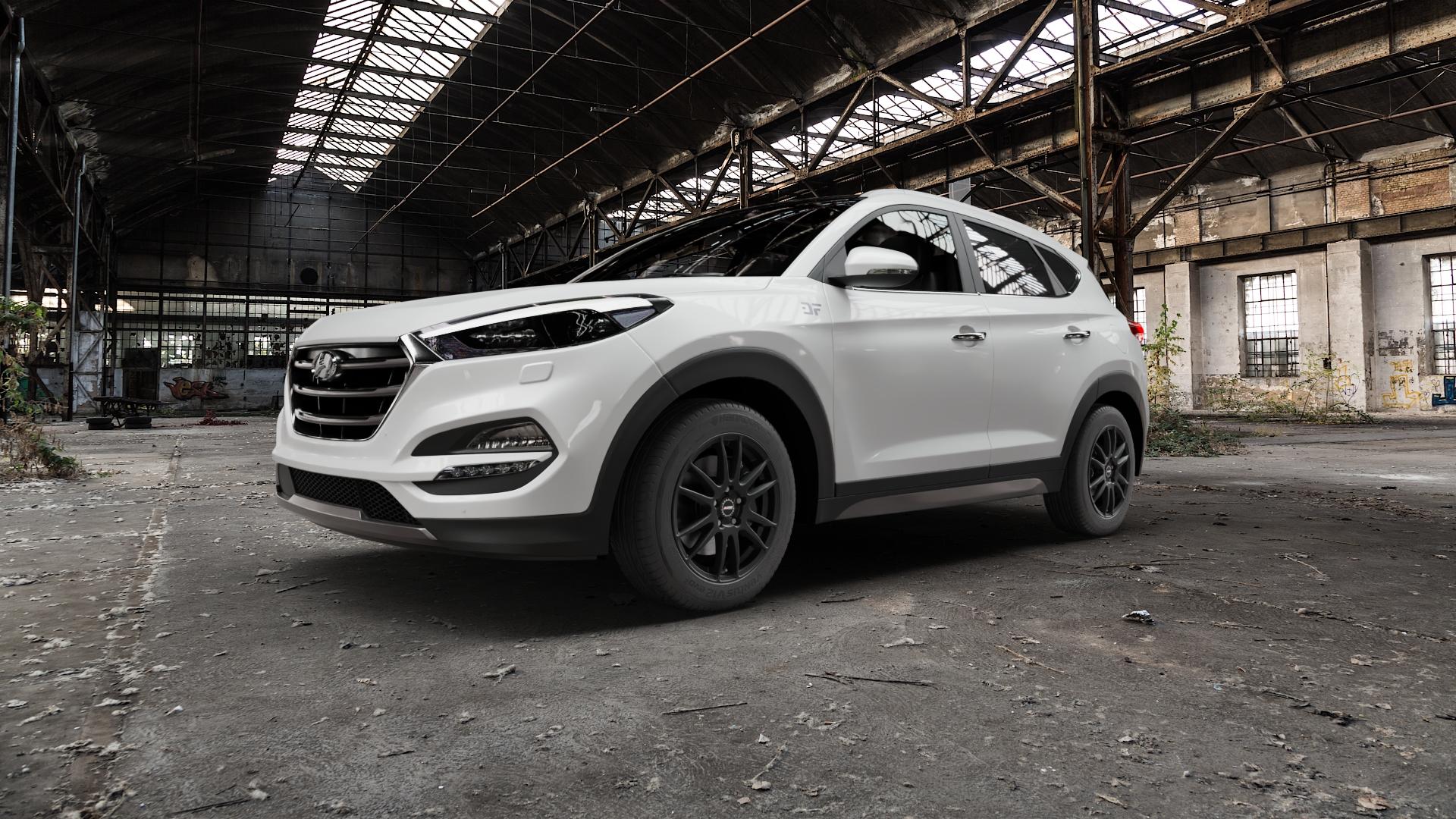 ALUTEC Monstr racing-schwarz Felge mit Reifen in 17Zoll Winterfelge Alufelge auf weissem Hyundai Tucson II Typ TLE TL Facelift ⬇️ mit 15mm Tieferlegung ⬇️ Old Industrial Hall_max5000mm_2022 Frontansicht_1