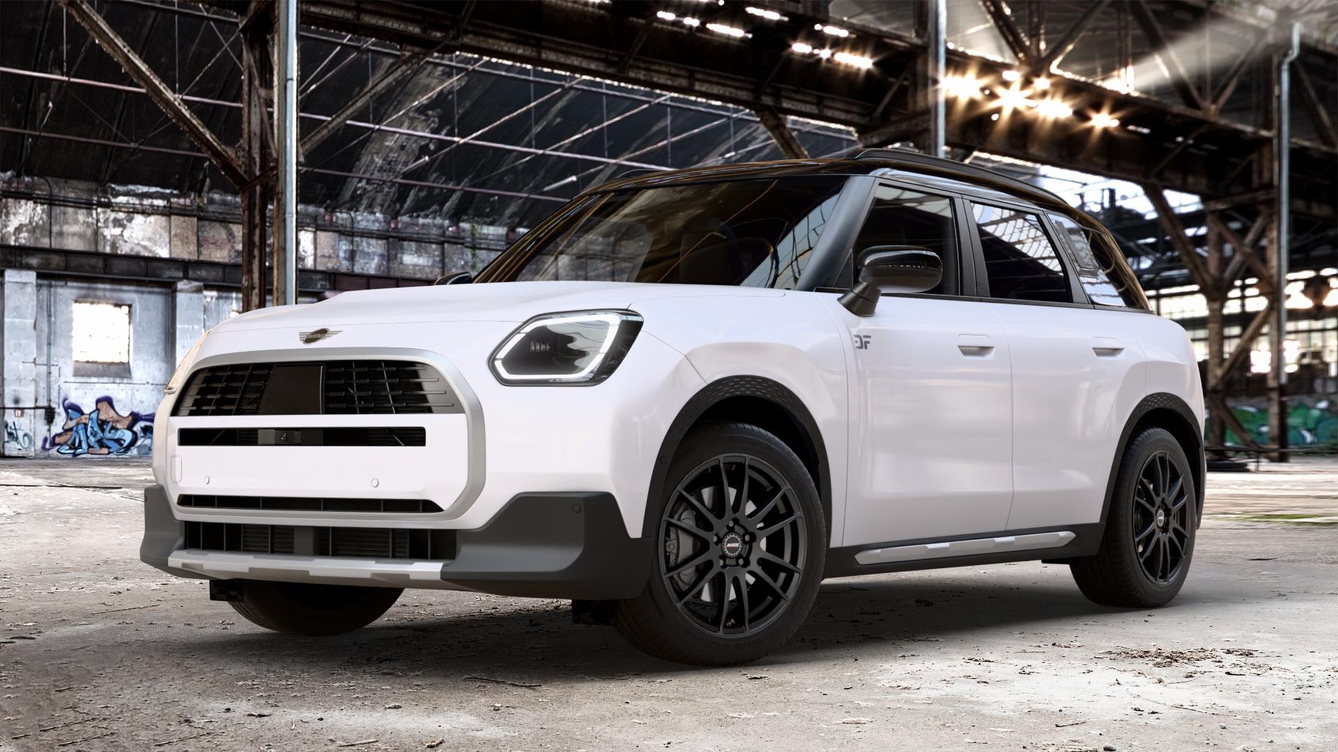 ALUTEC Monstr racing-schwarz Felge mit Reifen in 18Zoll Winterfelge Alufelge auf weissem Mini U25 Typ UMX (Countryman) 1,5l C 100kW Mild-Hybrid (136 PS) 115kW (156 2,0l JCW ALL4 221kW (300 D 110kW (150 0,0l E 68kW (92 S 150kW (204 SE 104kW (141 ⬇️ mit 15mm Tieferlegung ⬇️ Old Industrial Hall_max_4400mm_2024 Frontansicht_1