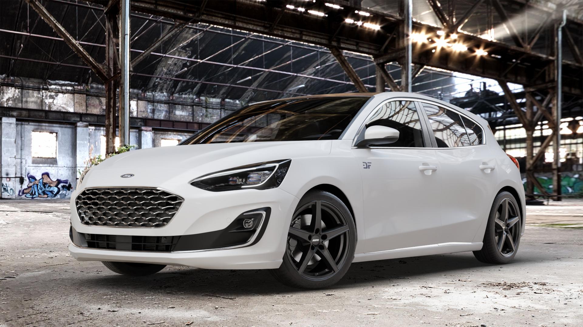 ALUTEC Raptr racing-schwarz Felge mit Reifen in 18Zoll Winterfelge Alufelge auf weissem Ford Focus IV Typ DEH (Schrägheck) ⬇️ mit 15mm Tieferlegung ⬇️ Old Industrial Hall_max_4400mm_2024 Frontansicht_1