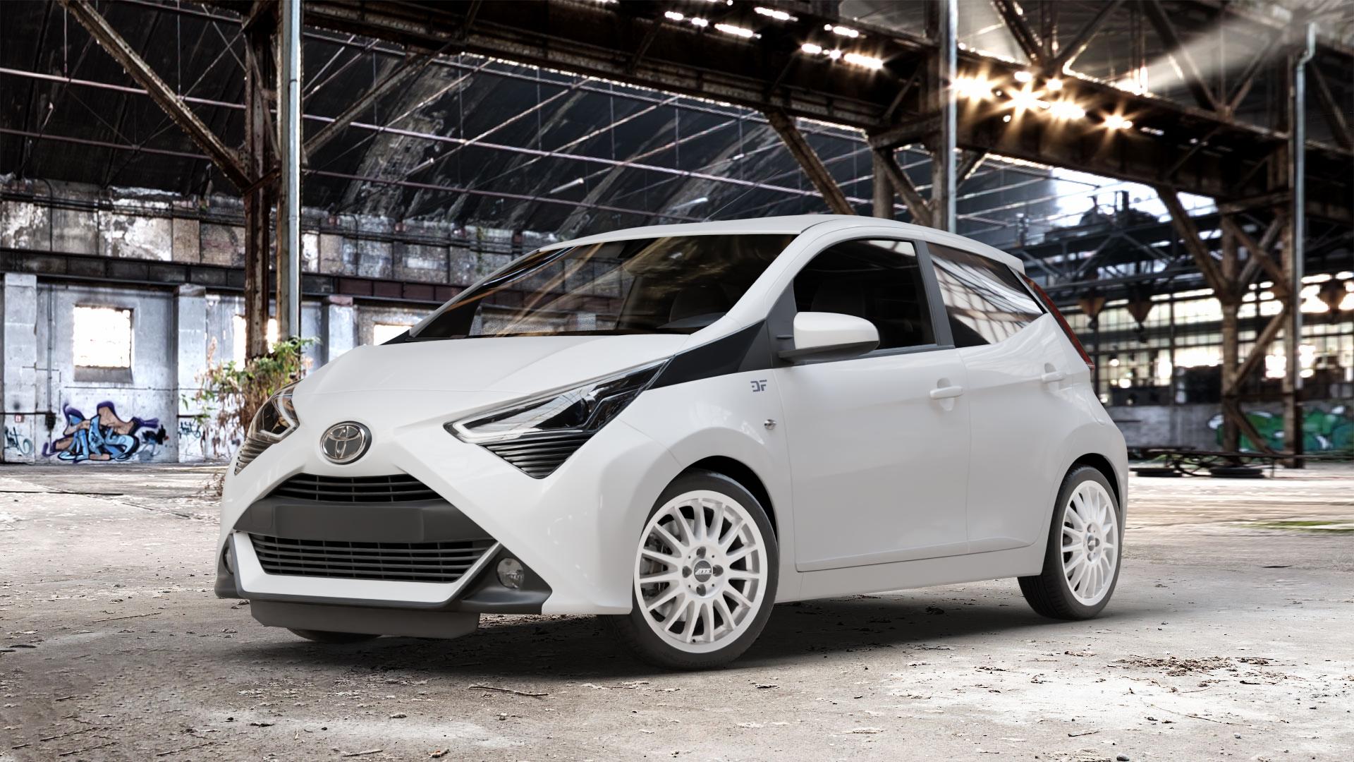 ATS Streetrallye polar-silber Felge mit Reifen in 16Zoll Winterfelge Alufelge auf weissem Toyota Aygo II Facelift ⬇️ mit 15mm Tieferlegung ⬇️ Old Industrial Hall_max_4400mm_2024 Frontansicht_1