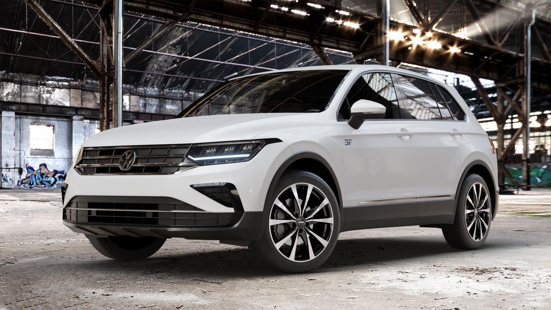 AUTEC Brixen Schwarz poliert Felge mit Reifen in 19Zoll Winterfelge Alufelge auf weissem Volkswagen (VW) Tiguan II Typ 5N Facelift ⬇️ mit 15mm Tieferlegung ⬇️ Old Industrial Hall_max_4400mm_2024 Frontansicht_1