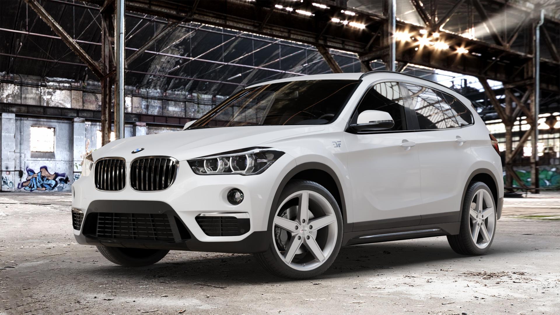 AUTEC Delano Hyper silber Felge mit Reifen in 19Zoll Winterfelge Alufelge auf weissem BMW X1 Typ F48 (UKL-L) (F1X) ⬇️ mit 15mm Tieferlegung ⬇️ Old Industrial Hall_max_4400mm_2024 Frontansicht_1
