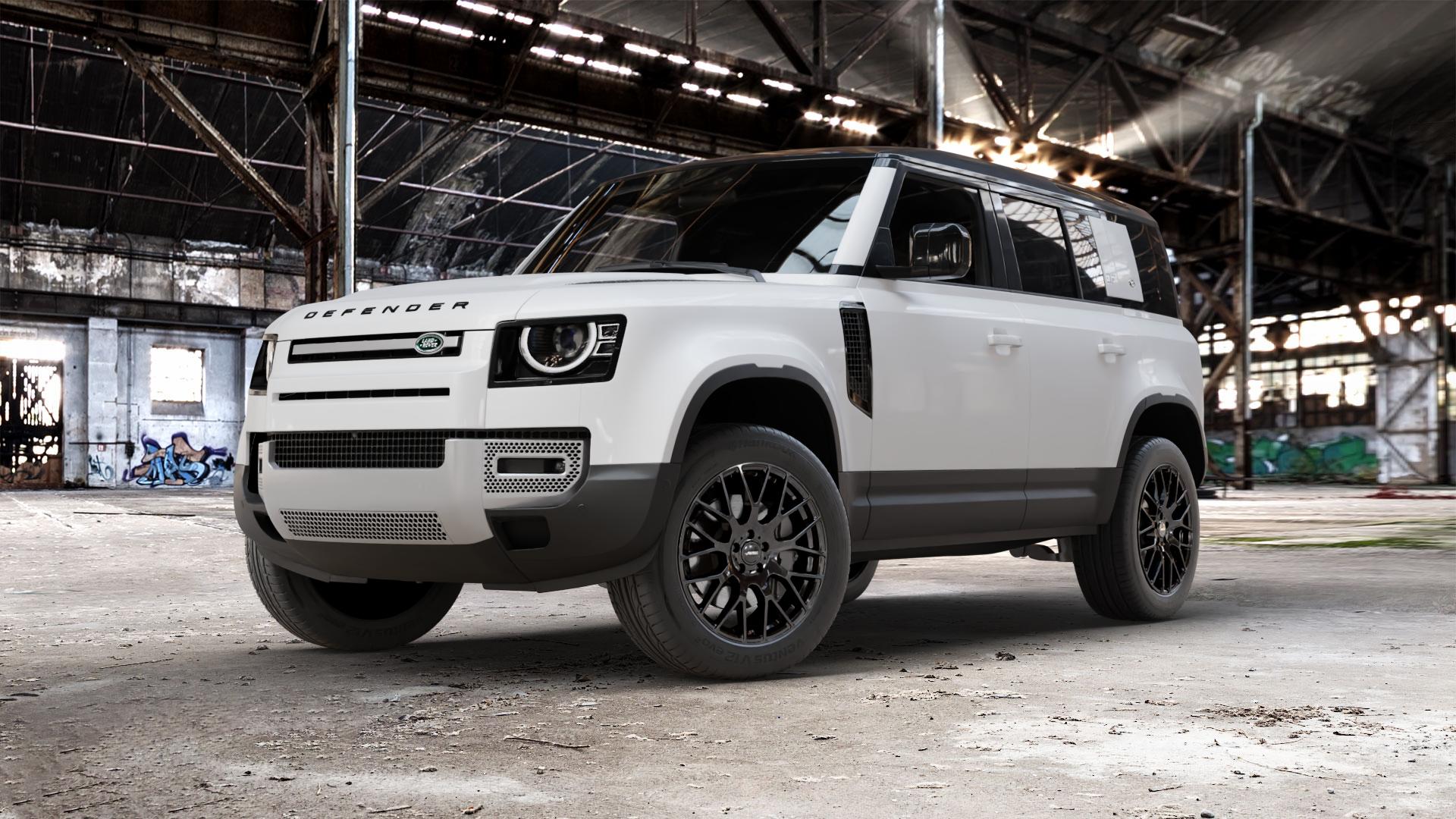 AUTEC Nimah Schwarz Felge mit Reifen in 20Zoll Winterfelge Alufelge auf weissem Land Rover Defender 110 Typ LE ⬇️ mit 15mm Tieferlegung ⬇️ Old Industrial Hall_max_5300mm_2024 Frontansicht_1