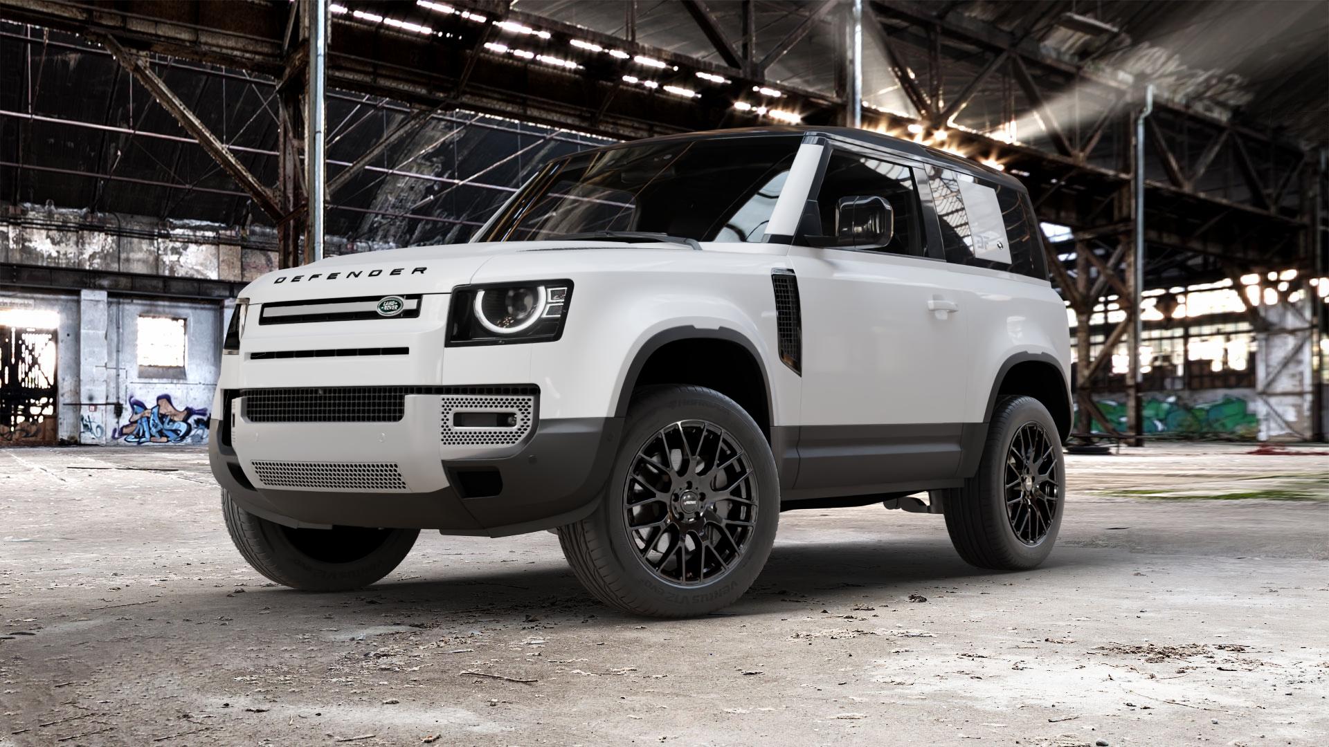 AUTEC Nimah Schwarz Felge mit Reifen in 20Zoll Winterfelge Alufelge auf weissem Land Rover Defender 90 Typ LE ⬇️ mit 15mm Tieferlegung ⬇️ Old Industrial Hall_max_5300mm_2024 Frontansicht_1