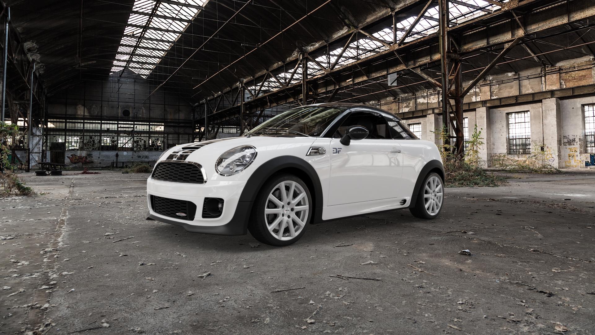 AUTEC Skandic Brillantsilber Felge mit Reifen in 17Zoll Winterfelge Alufelge auf weissem Mini R58 Typ UKL-C (Coupe) 1,6l Cooper 90kW (122 PS) S 135kW (184 2,0l SD 105kW (143 JCW 155kW (211 ⬇️ mit 15mm Tieferlegung ⬇️ Old Industrial Hall_max5000mm_2022 Frontansicht_1
