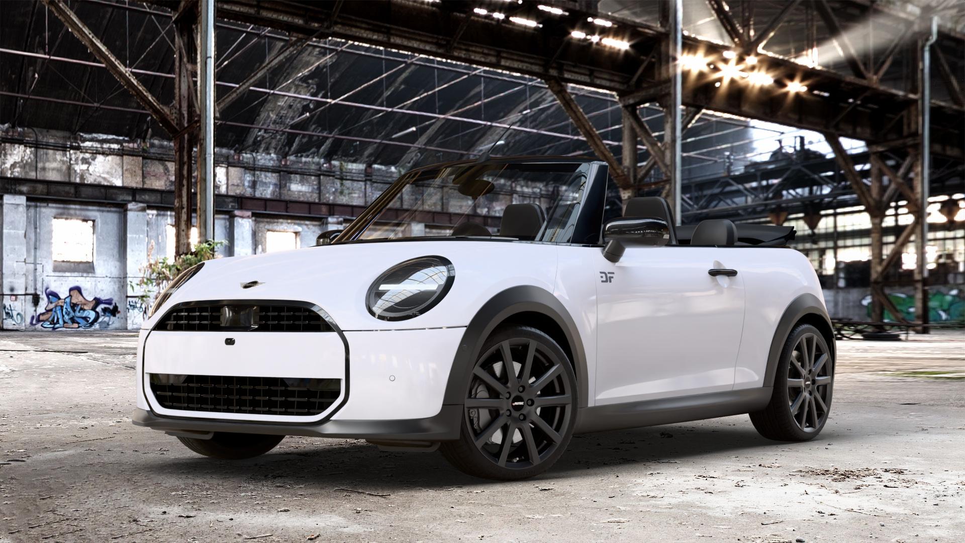 AUTEC Skandic Schwarz matt Felge mit Reifen in 18Zoll Winterfelge Alufelge auf weissem Mini F67 Typ FM6 (Cabrio) 2,0l Cooper 120kW (163 PS) S 150kW (204 JCW 170kW (231 ⬇️ mit 15mm Tieferlegung ⬇️ Old Industrial Hall_max_4400mm_2024 Frontansicht_1