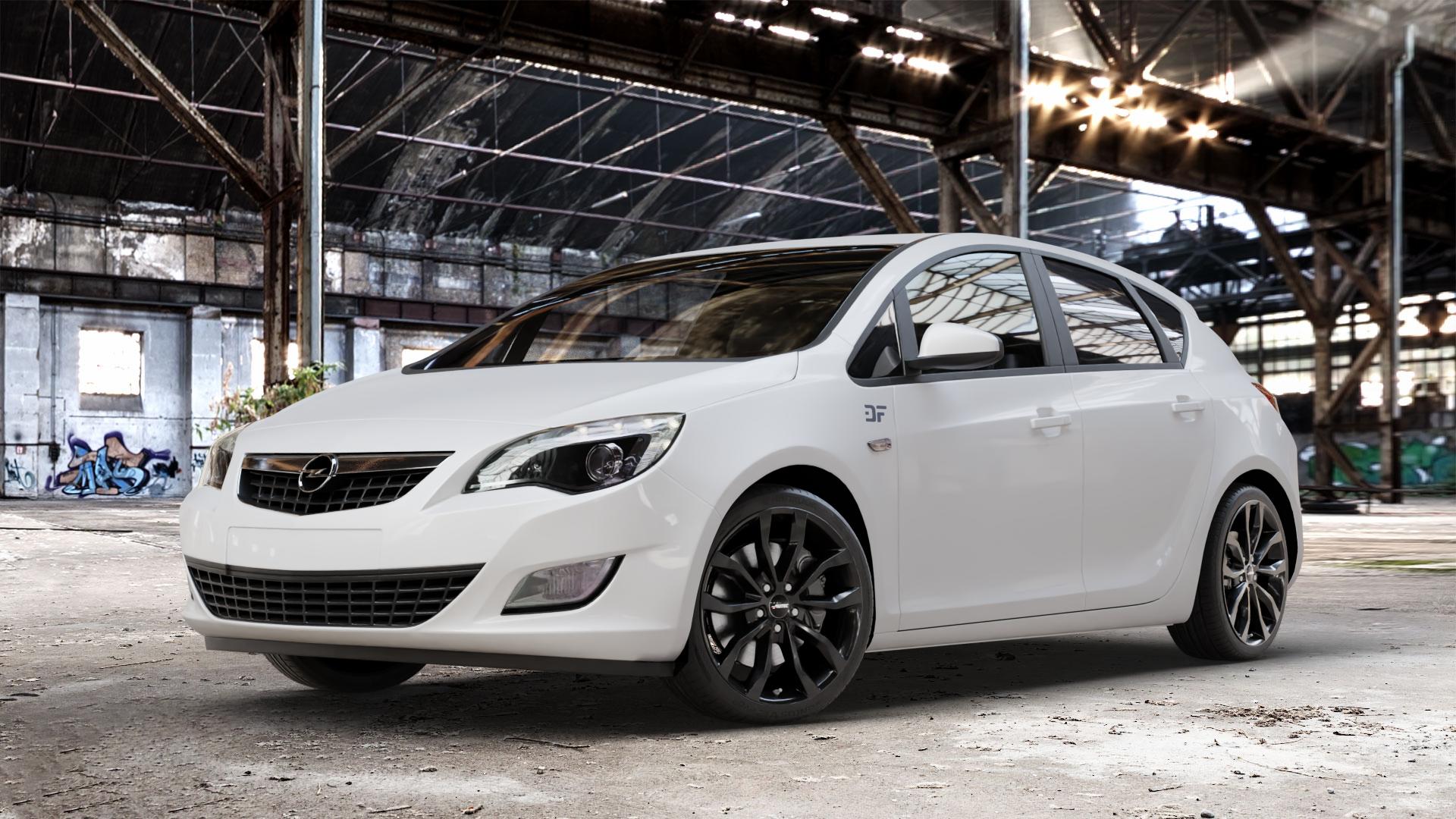 AUTEC Uteca Schwarz Felge mit Reifen in 18Zoll Winterfelge Alufelge auf weissem Opel Astra J Typ P-J Stufenheck ⬇️ mit 15mm Tieferlegung ⬇️ Old Industrial Hall_max_4400mm_2024 Frontansicht_1