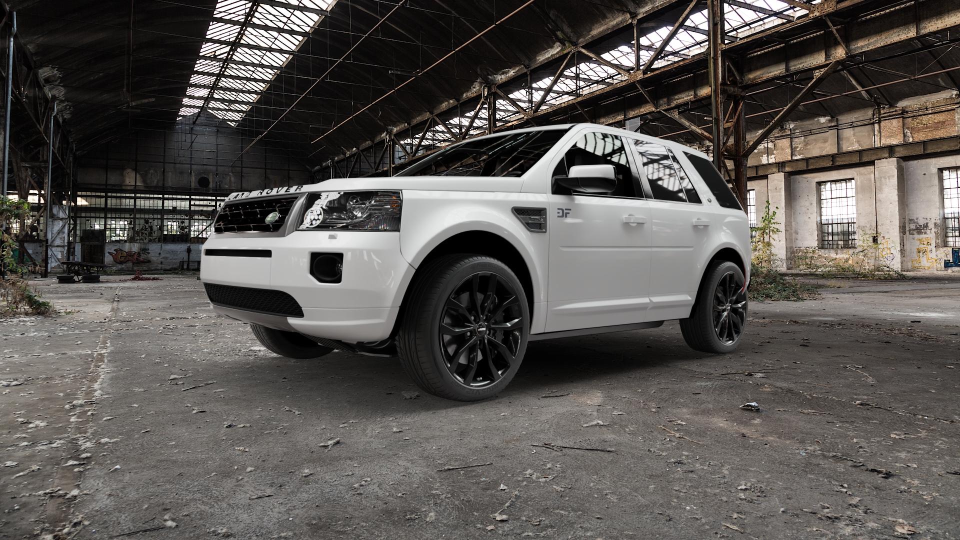 AUTEC Uteca Schwarz Felge mit Reifen in 20Zoll Winterfelge Alufelge auf weissem Land Rover Freelander II Typ LF ⬇️ mit 15mm Tieferlegung ⬇️ Old Industrial Hall_max5000mm_2022 Frontansicht_1