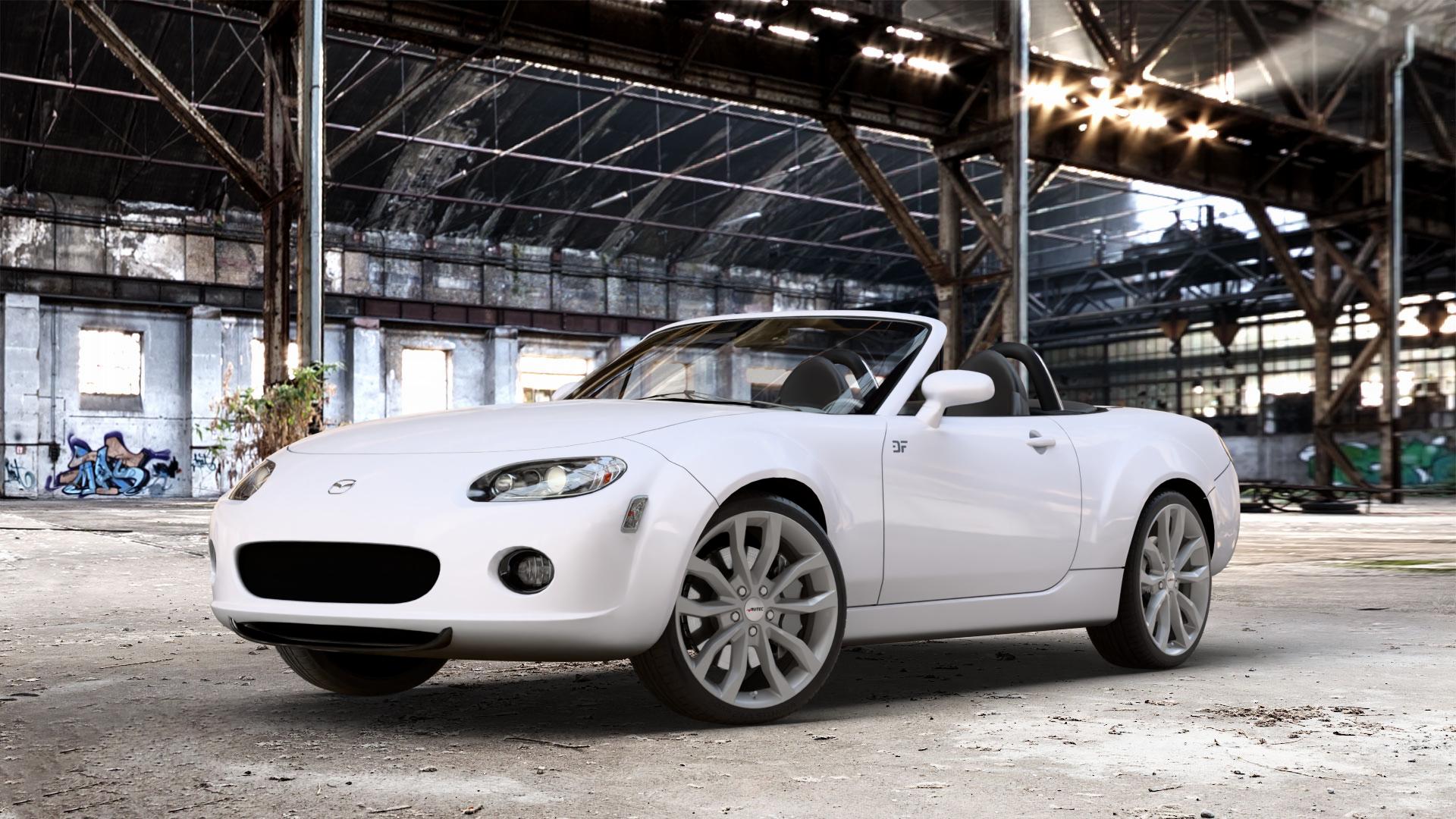 AUTEC Uteca Titansilber Felge mit Reifen grau anthrazit metallic in 18Zoll Winterfelge Alufelge auf weissem Mazda MX-5 III (NC) ⬇️ mit 15mm Tieferlegung ⬇️ Old Industrial Hall_max_4400mm_2024 Frontansicht_1