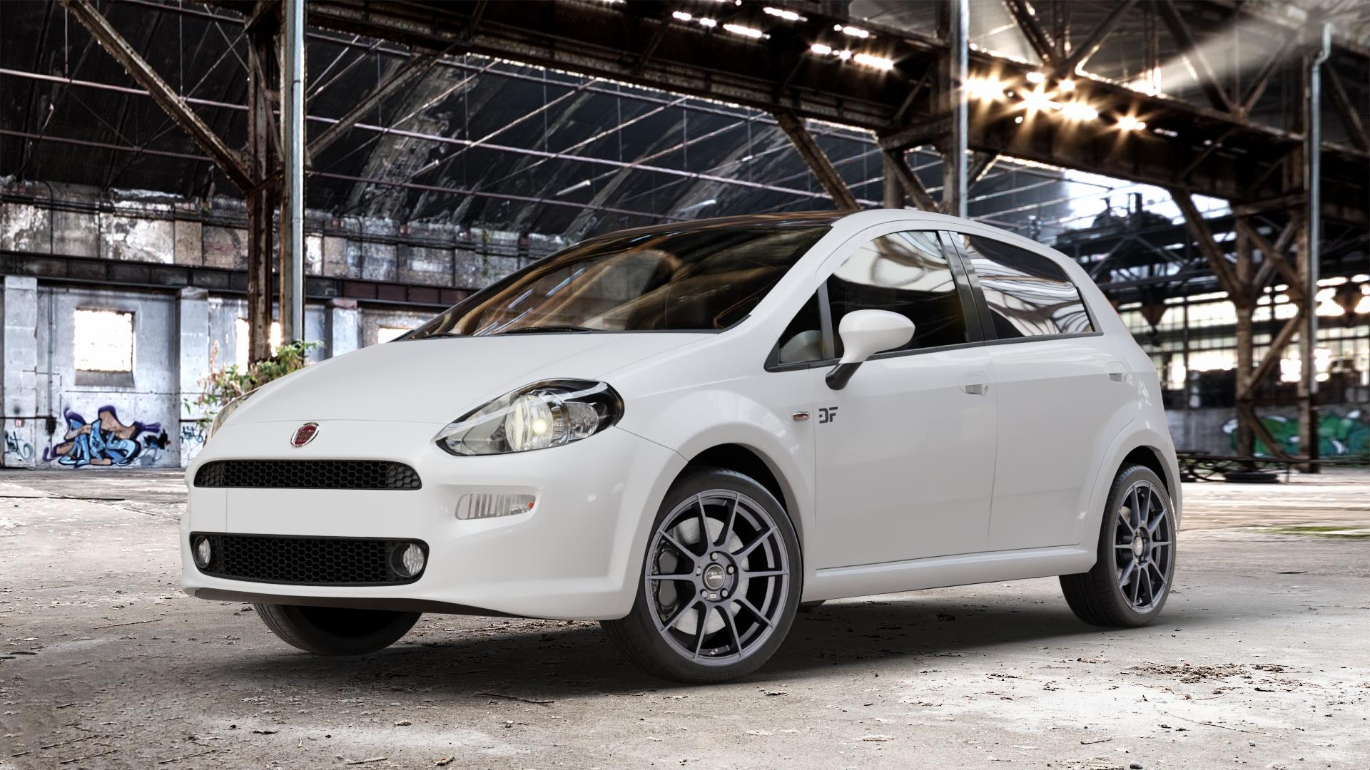 AUTEC Wizard Gunmetal matt Felge mit Reifen grau in 17Zoll Winterfelge Alufelge auf weissem Fiat Punto / Grande Typ 199 (12->) ⬇️ mit 15mm Tieferlegung ⬇️ Old Industrial Hall_max_4400mm_2024 Frontansicht_1