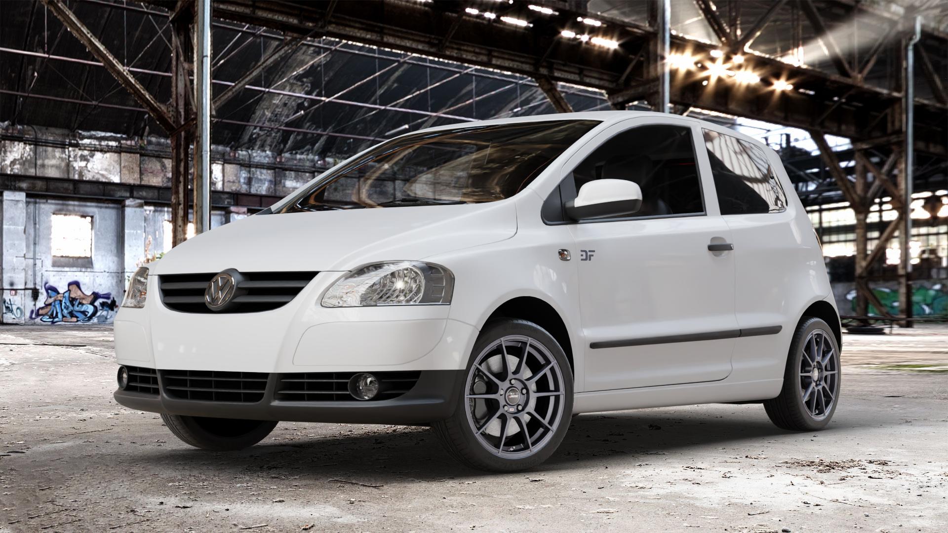 AUTEC Wizard Gunmetal matt Felge mit Reifen grau in 17Zoll Winterfelge Alufelge auf weissem Volkswagen (VW) Fox ⬇️ mit 15mm Tieferlegung ⬇️ Old Industrial Hall_max_4400mm_2024 Frontansicht_1