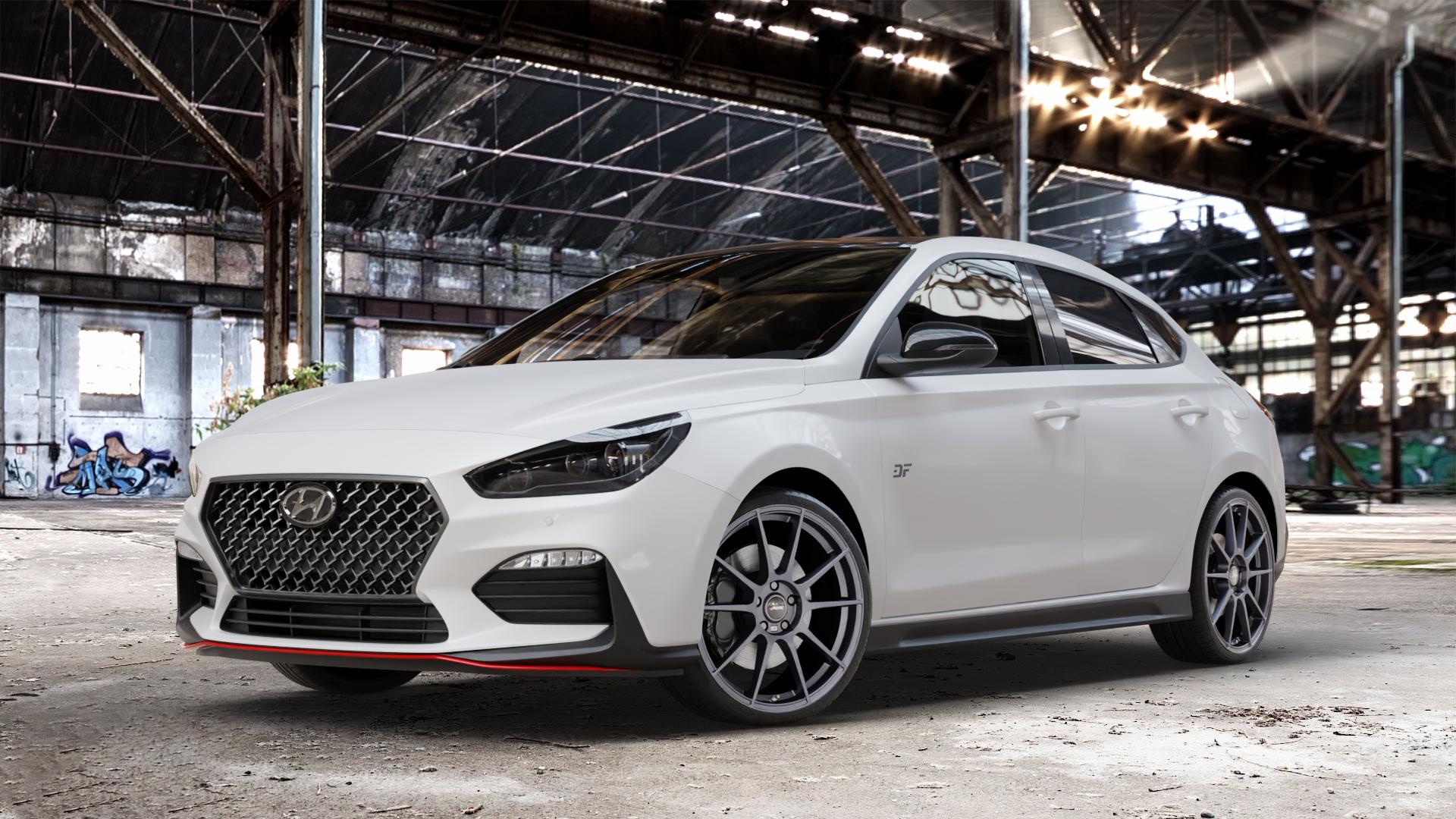 AUTEC Wizard Gunmetal matt Felge mit Reifen grau in 19Zoll Winterfelge Alufelge auf weissem Hyundai i30 Typ PDE Fastback ⬇️ mit 15mm Tieferlegung ⬇️ Old Industrial Hall_max_4400mm_2024 Frontansicht_1