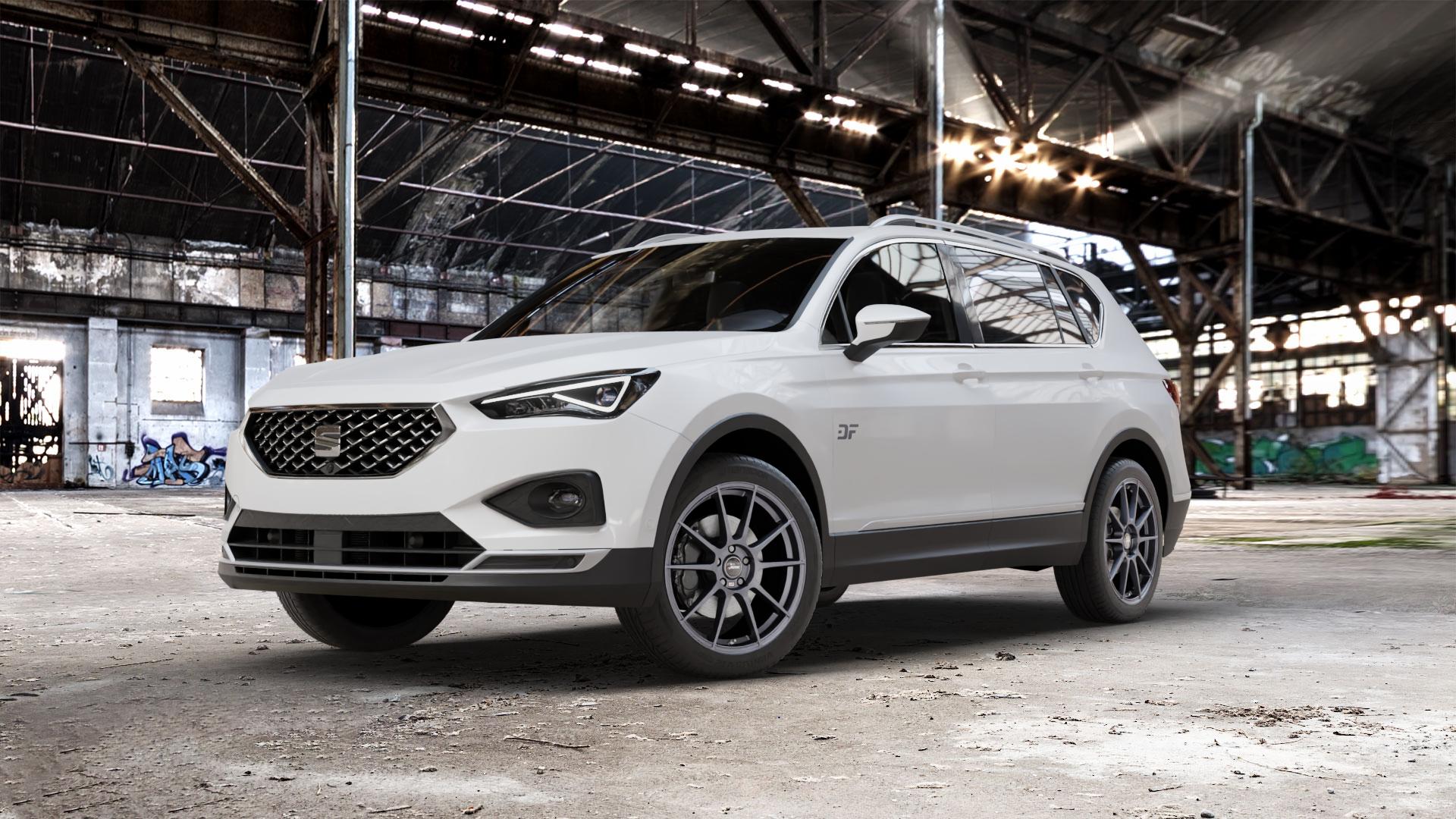 AUTEC Wizard Gunmetal matt Felge mit Reifen grau in 19Zoll Winterfelge Alufelge auf weissem Seat Tarraco Typ KN ⬇️ mit 15mm Tieferlegung ⬇️ Old Industrial Hall_max_5300mm_2024 Frontansicht_1