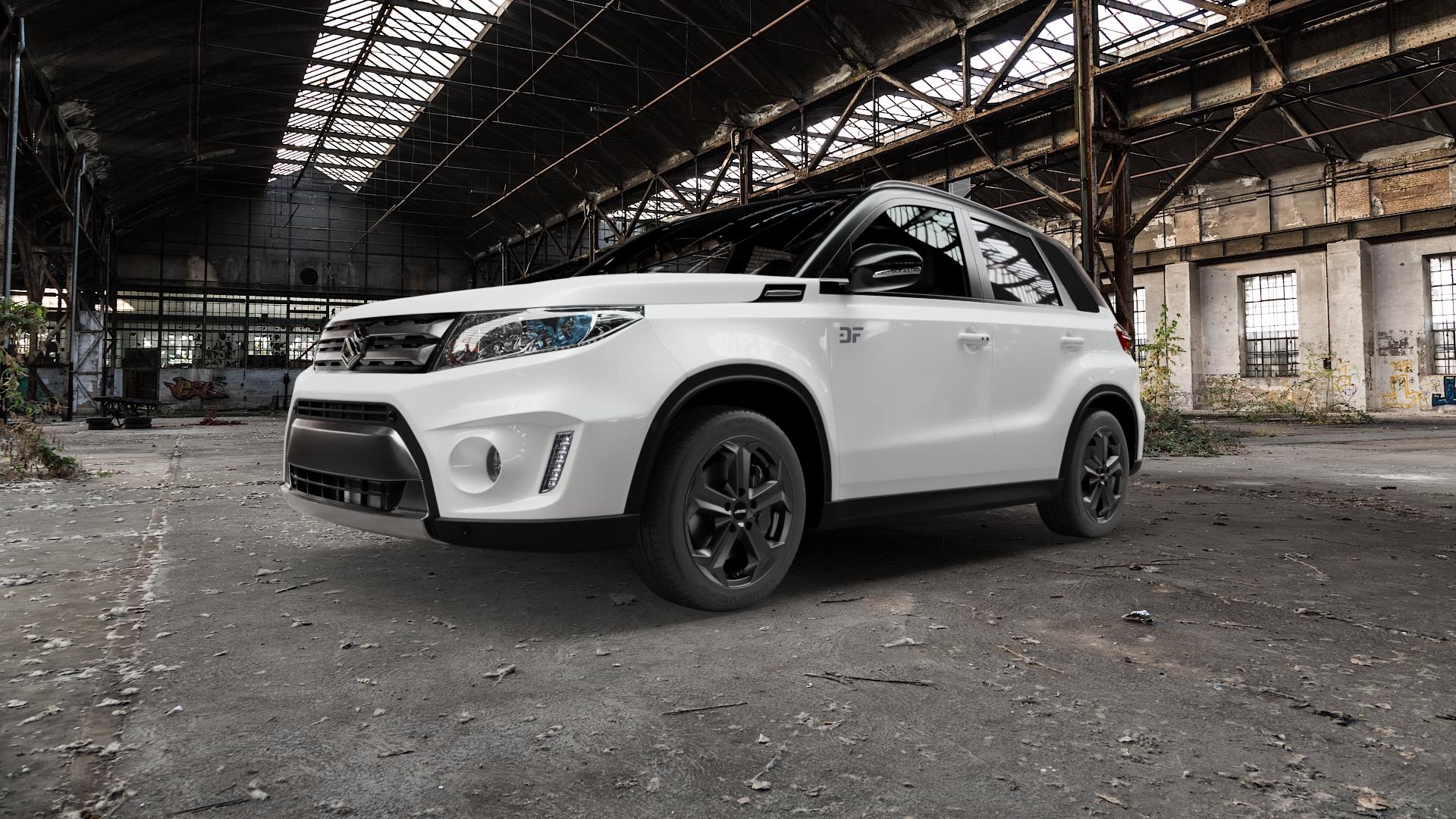 AUTEC Xenos Schwarz matt Felge mit Reifen in 17Zoll Winterfelge Alufelge auf weissem Suzuki Vitara Typ LY 1,6l 88kW (120 PS) 4WD D ⬇️ mit 15mm Tieferlegung ⬇️ Old Industrial Hall_max5000mm_2022 Frontansicht_1