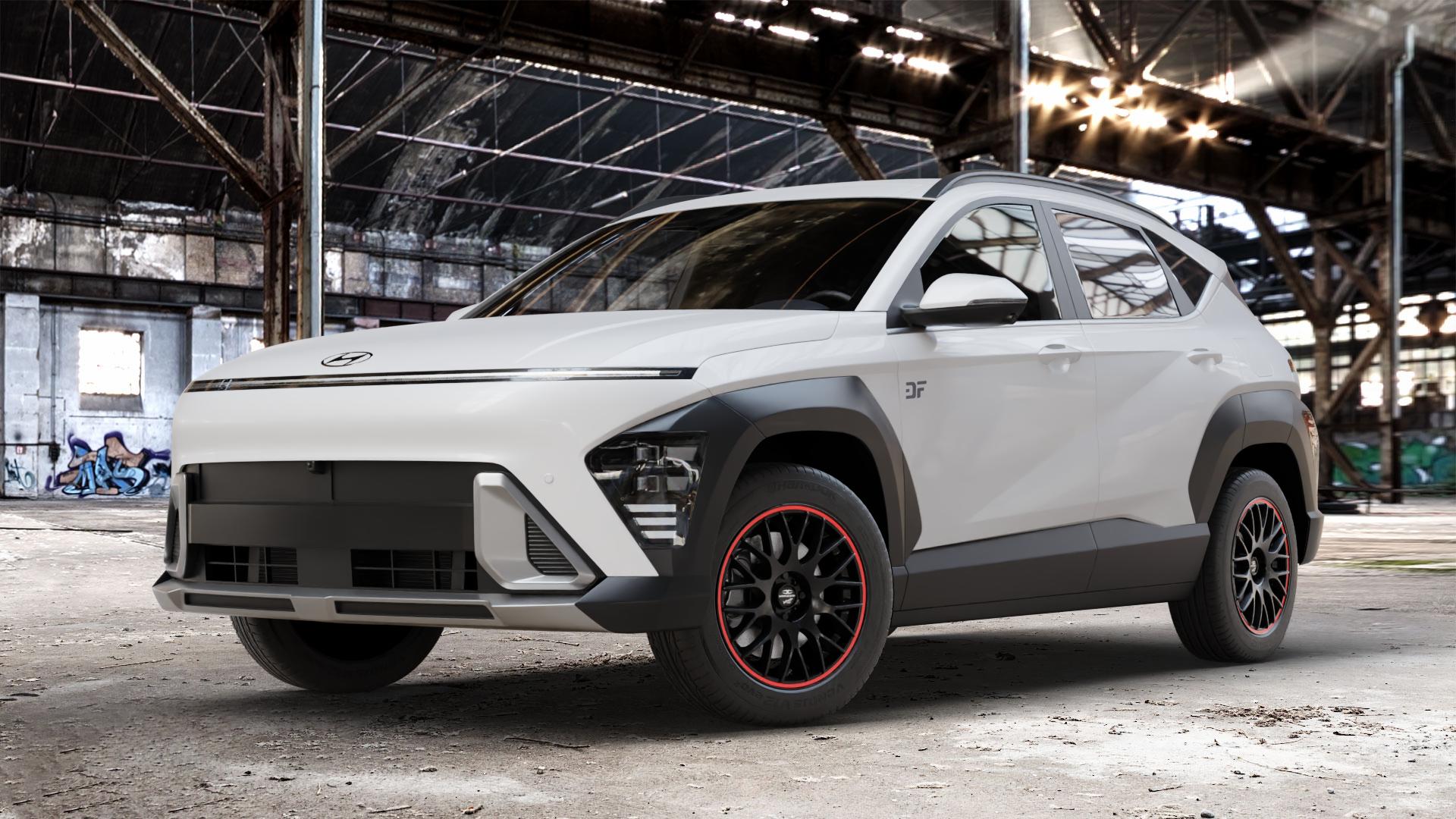 BARRACUDA Karizzma Mattblack Puresports / Color Trim rot Felge mit Reifen schwarz farbige Outline mehrfarbig schwarz matt in 17Zoll Winterfelge Alufelge auf weissem Hyundai Kona Typ SX2 ⬇️ mit 15mm Tieferlegung ⬇️ Old Industrial Hall_max_4400mm_2024 Frontansicht_1