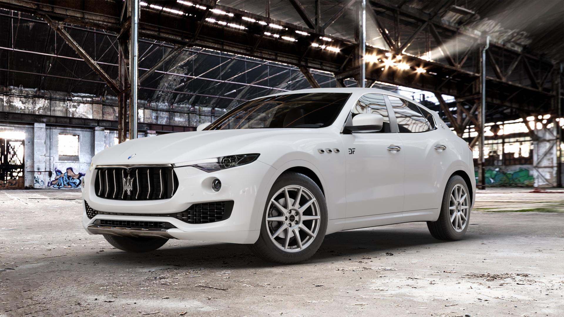 Borbet GTX titan glossy Felge mit Reifen grau in 19Zoll Winterfelge Alufelge auf weissem Maserati Levante Typ M156 ⬇️ mit 15mm Tieferlegung ⬇️ Old Industrial Hall_max_5300mm_2024 Frontansicht_1