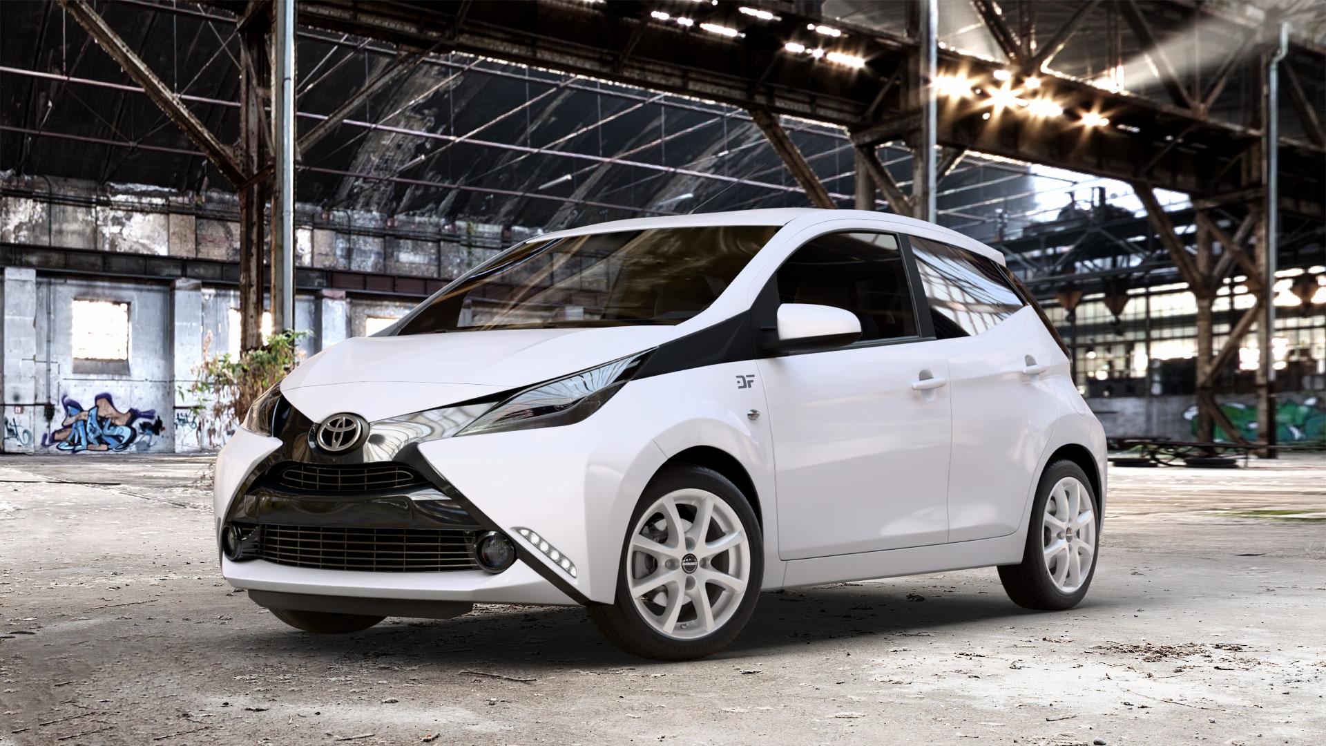Borbet LV4 crystal silver Felge mit Reifen silber in 15Zoll Winterfelge Alufelge auf weissem Toyota Aygo II 1,0l 51kW (69 PS) ⬇️ mit 15mm Tieferlegung ⬇️ Old Industrial Hall_max_4400mm_2024 Frontansicht_1