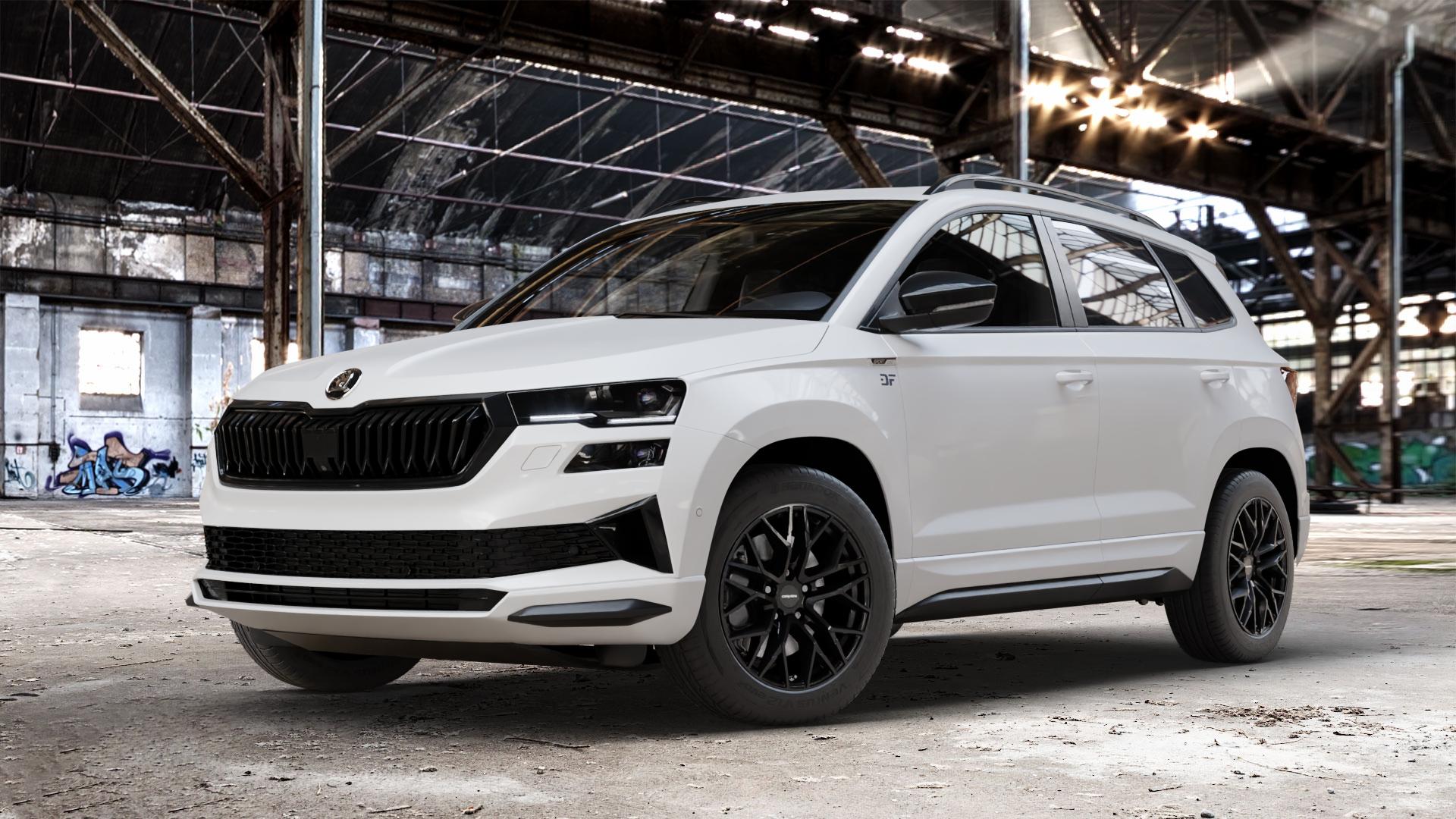 CARMANI 20 Ludwig black Felge mit Reifen schwarz in 17Zoll Winterfelge Alufelge auf weissem Skoda Karoq Typ NU Facelift ⬇️ mit 15mm Tieferlegung ⬇️ Old Industrial Hall_max_4400mm_2024 Frontansicht_1