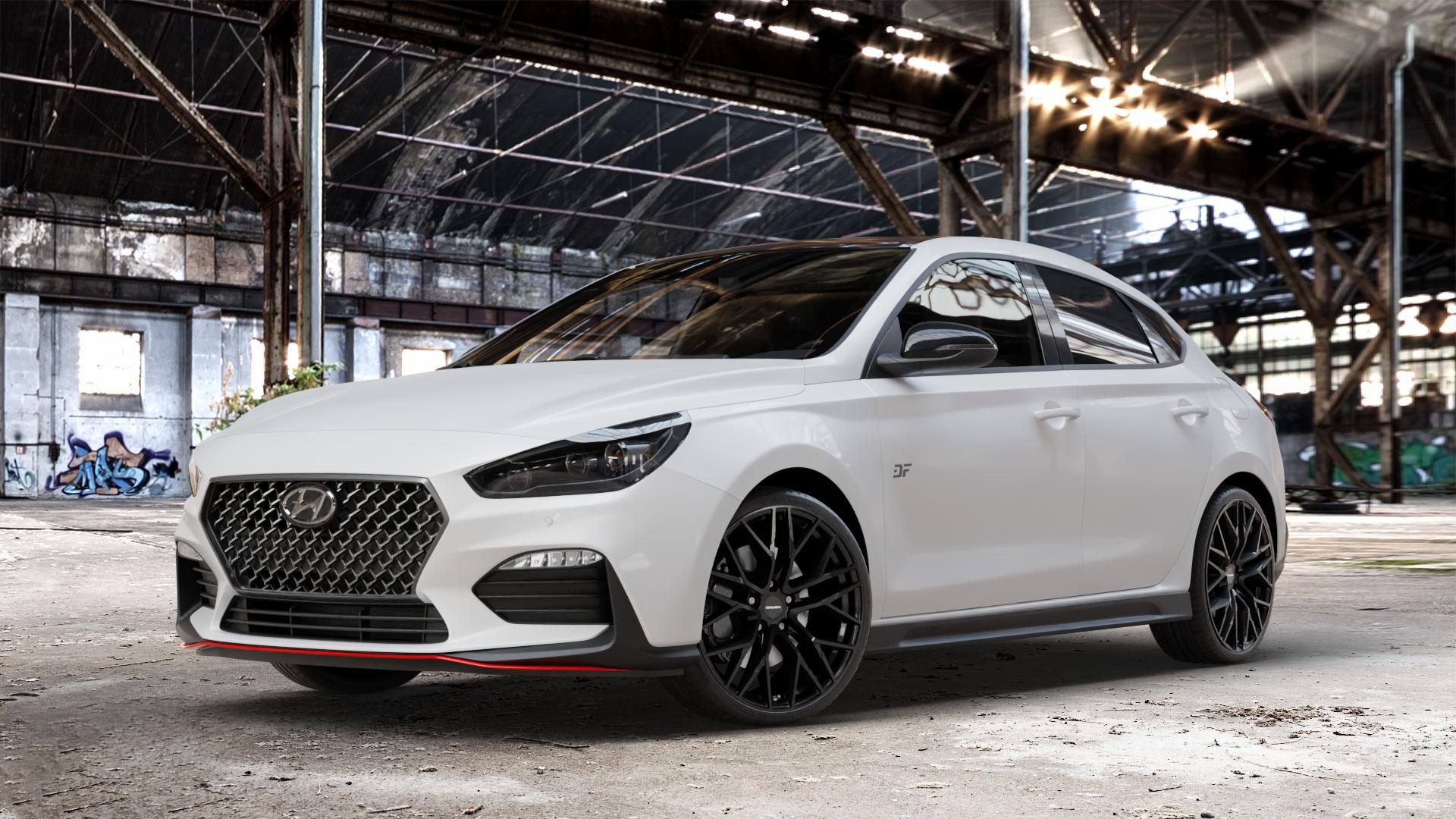 CARMANI 20 Ludwig black Felge mit Reifen schwarz in 19Zoll Winterfelge Alufelge auf weissem Hyundai i30 Typ PDE Fastback ⬇️ mit 15mm Tieferlegung ⬇️ Old Industrial Hall_max_4400mm_2024 Frontansicht_1