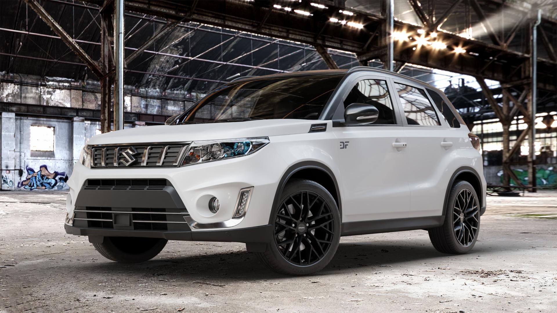CARMANI 20 Ludwig black matt Felge mit Reifen schwarz in 18Zoll Winterfelge Alufelge auf weissem Suzuki Vitara Typ LY 1,4l Turbo 103kW (140 PS) 4WD l kW (0 ⬇️ mit 15mm Tieferlegung ⬇️ Old Industrial Hall_max_4400mm_2024 Frontansicht_1