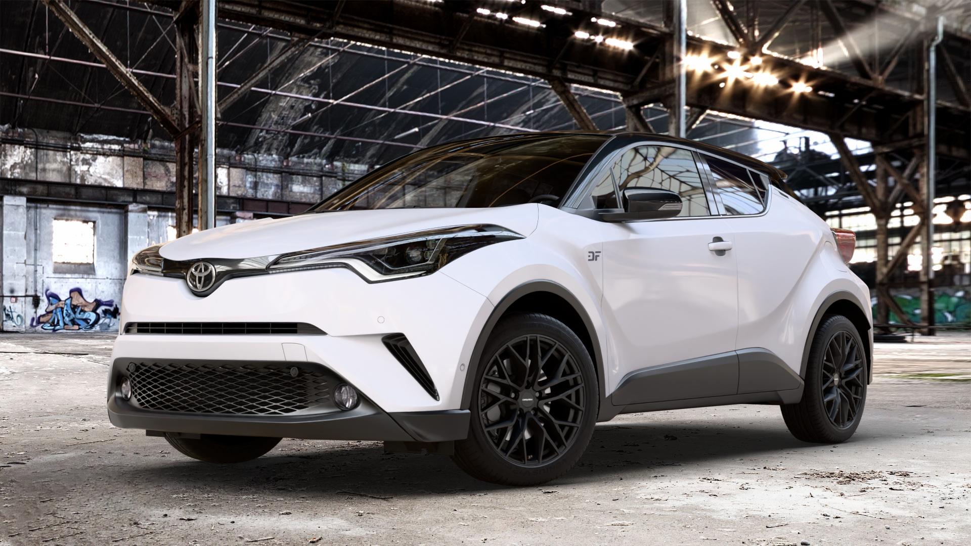 CARMANI 20 Ludwig black matt Felge mit Reifen schwarz in 18Zoll Winterfelge Alufelge auf weissem Toyota C-HR Typ AX1T(EU,M) AX1T(EU,M)-TMG ⬇️ mit 15mm Tieferlegung ⬇️ Old Industrial Hall_max_4400mm_2024 Frontansicht_1