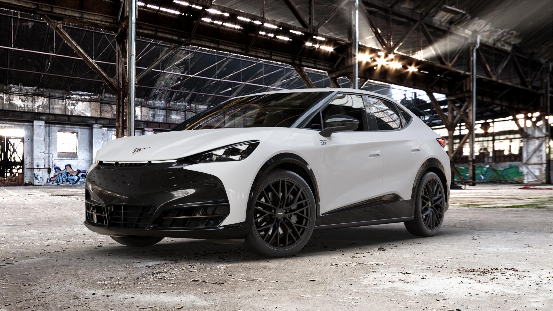 CARMANI 20 Ludwig black matt Felge mit Reifen schwarz in 21Zoll Winterfelge Alufelge auf weissem Cupra Tavascan Typ KR ⬇️ mit 15mm Tieferlegung ⬇️ Old Industrial Hall_max_5300mm_2024 Frontansicht_1