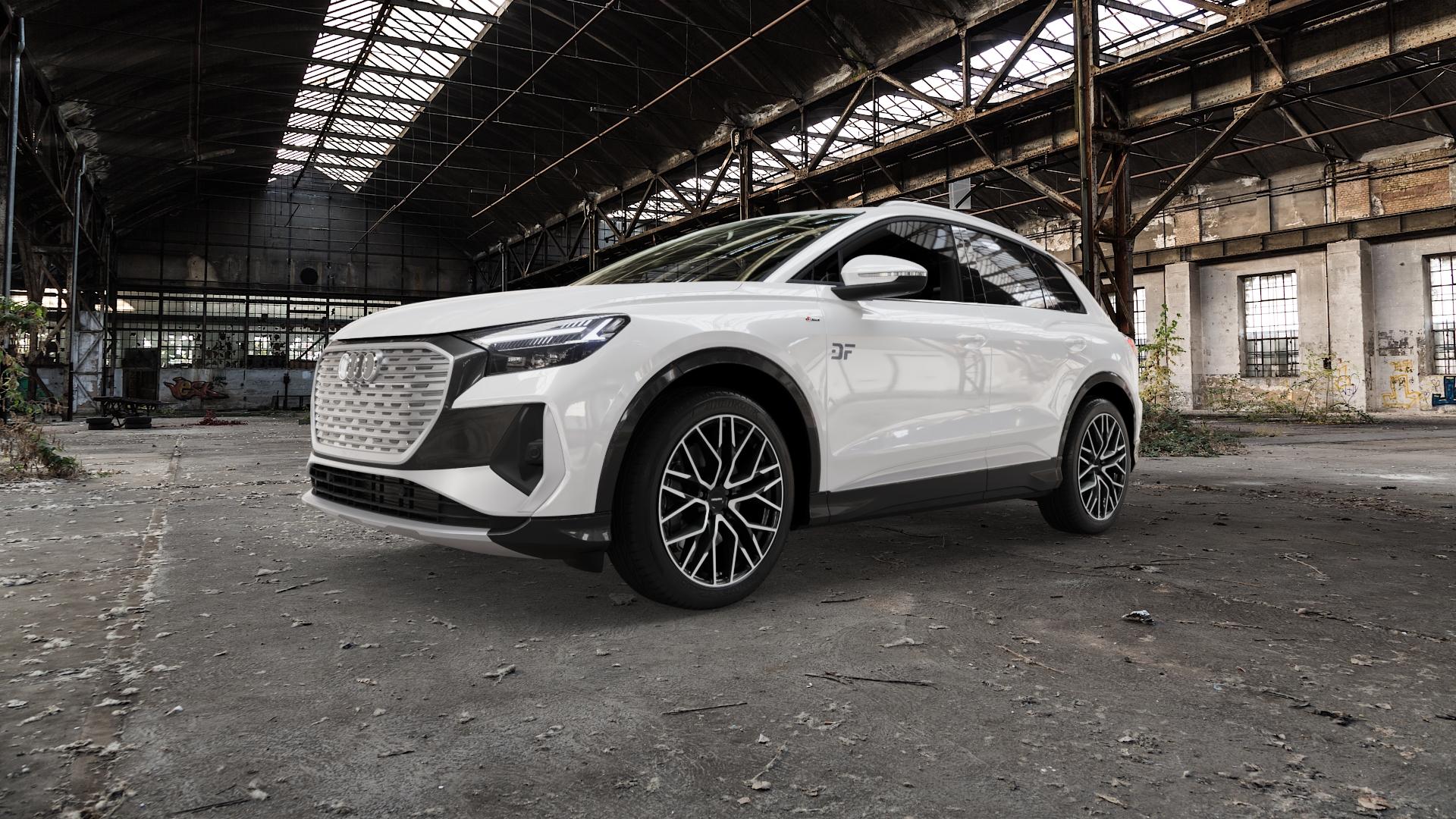 CARMANI 20 Ludwig black polish Felge mit Reifen schwarz in 20Zoll Winterfelge Alufelge auf weissem Audi Q4 Typ FZ ⬇️ mit 15mm Tieferlegung ⬇️ Old Industrial Hall_max5000mm_2022 Frontansicht_1