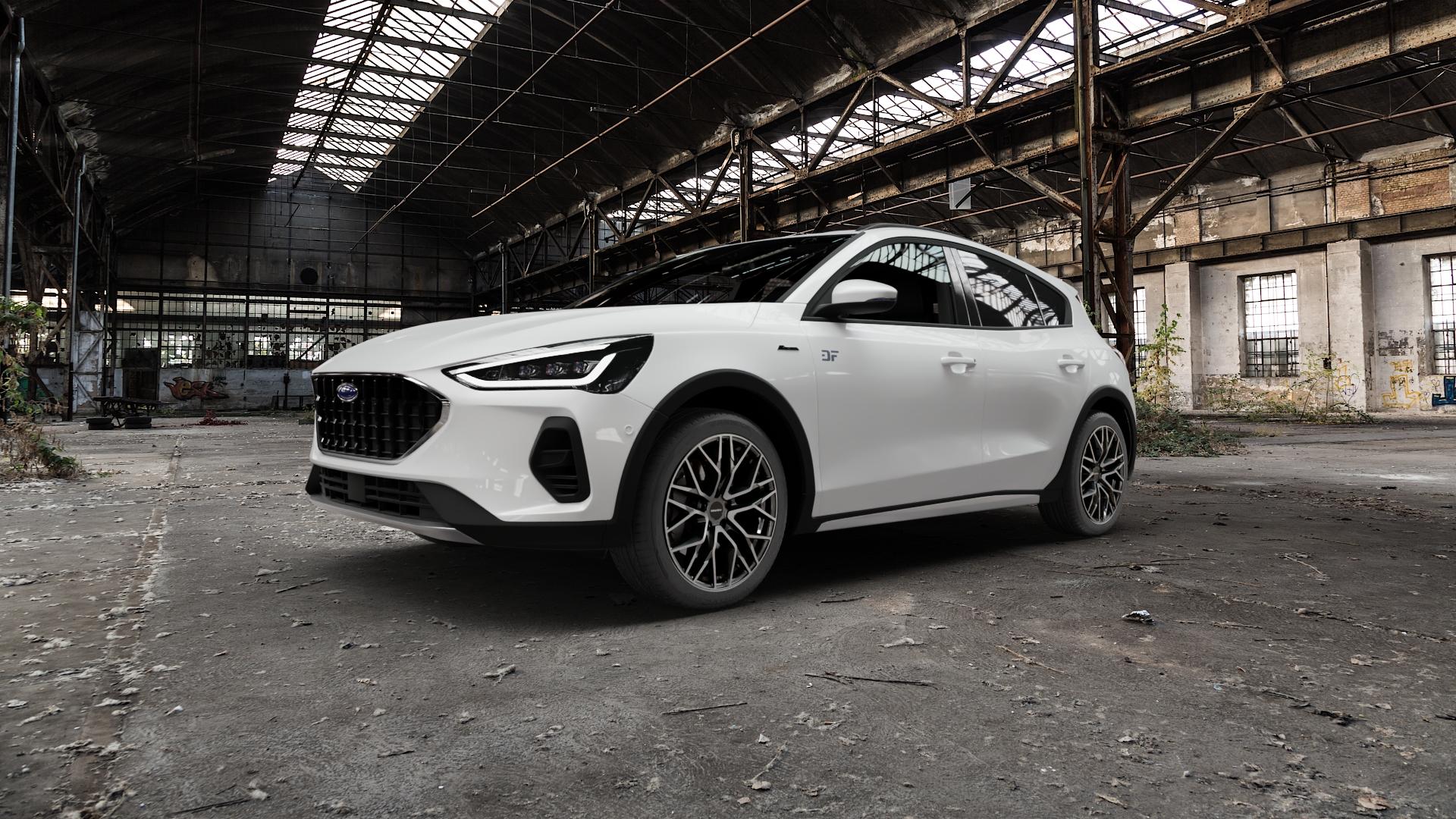 CARMANI 20 Ludwig hyper gun polish Felge mit Reifen silber anthrazit in 18Zoll Winterfelge Alufelge auf weissem Ford Focus IV Active Typ DEH Facelift (Schrägheck) ⬇️ mit 15mm Tieferlegung ⬇️ Old Industrial Hall_max5000mm_2022 Frontansicht_1