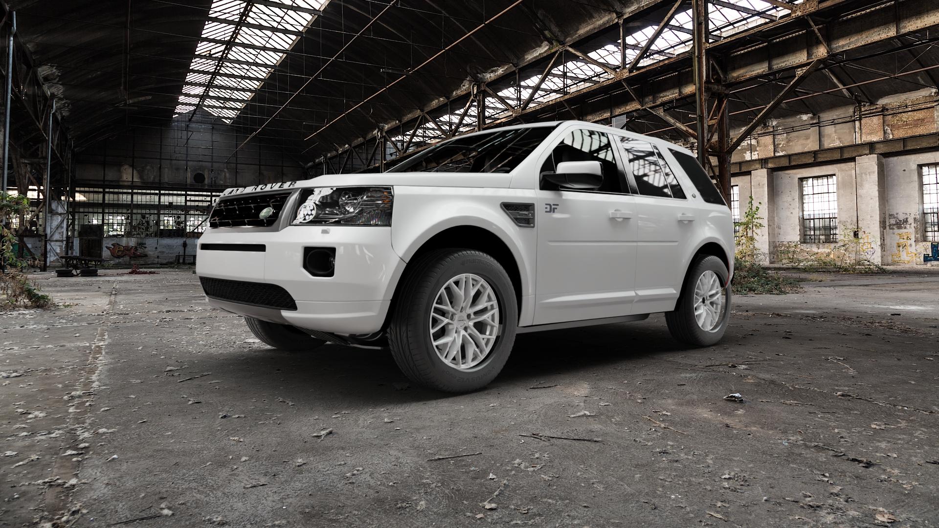 CARMANI 20 Ludwig white silver Felge mit Reifen silber weiss in 17Zoll Winterfelge Alufelge auf weissem Land Rover Freelander II Typ LF ⬇️ mit 15mm Tieferlegung ⬇️ Old Industrial Hall_max5000mm_2022 Frontansicht_1