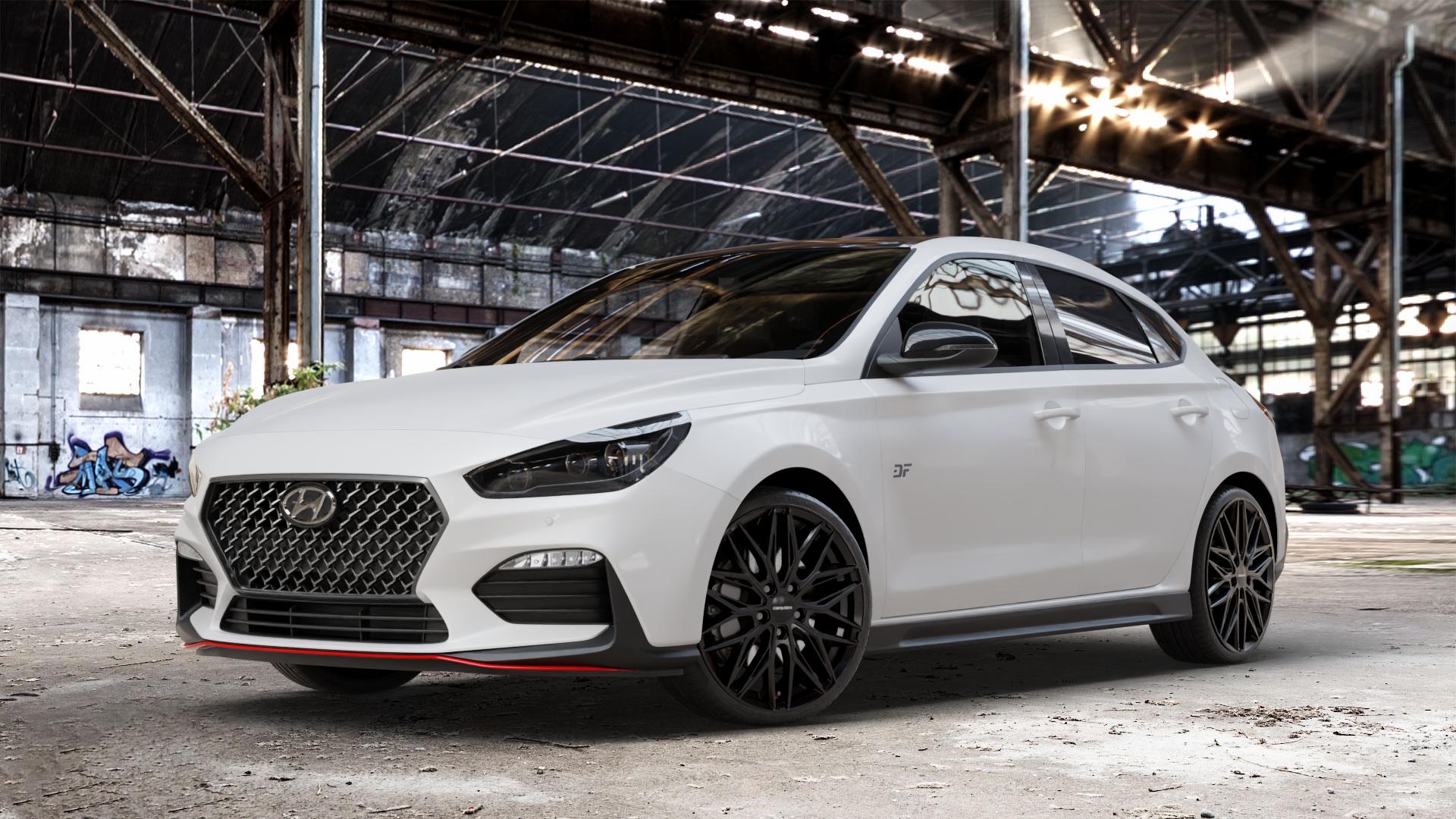 CARMANI 26 Max black Felge mit Reifen schwarz in 19Zoll Winterfelge Alufelge auf weissem Hyundai i30 Typ PDE Fastback ⬇️ mit 15mm Tieferlegung ⬇️ Old Industrial Hall_max_4400mm_2024 Frontansicht_1