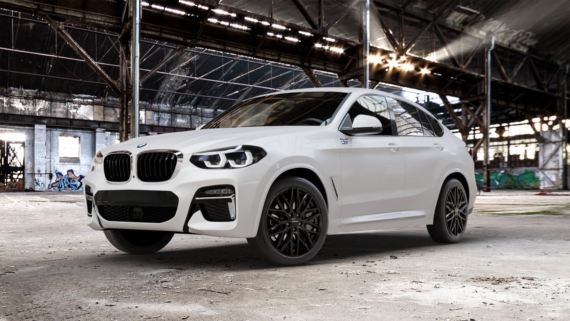 CARMANI 26 Max black Felge mit Reifen schwarz in 20Zoll Winterfelge Alufelge auf weissem BMW X4 Typ G02 (G4X) ⬇️ mit 15mm Tieferlegung ⬇️ Old Industrial Hall_max_5300mm_2024 Frontansicht_1