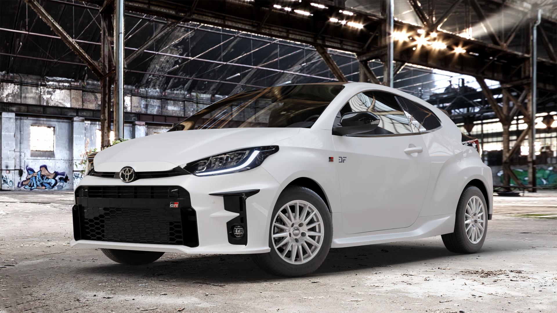 CMS C23 Racing Silver Felge mit Reifen silber in 15Zoll Winterfelge Alufelge auf weissem Toyota Yaris IV Typ XPA1F(EU,M) l kW (0 PS) GR XPA1G(EU,M) ⬇️ mit 15mm Tieferlegung ⬇️ Old Industrial Hall_max_4400mm_2024 Frontansicht_1