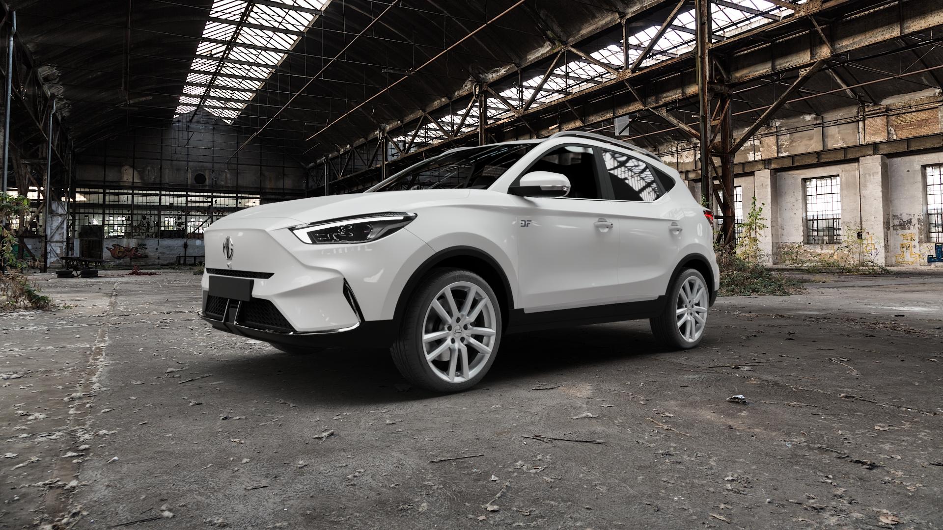 CMS C27 Racing Silver Felge mit Reifen silber in 18Zoll Winterfelge Alufelge auf weissem MG ZS EV Typ ZS1 ⬇️ mit 15mm Tieferlegung ⬇️ Old Industrial Hall_max5000mm_2022 Frontansicht_1