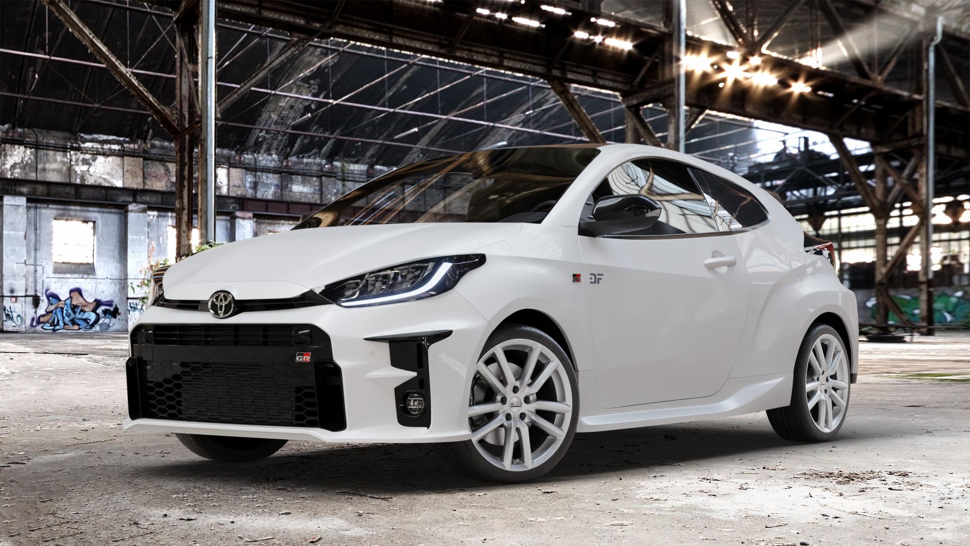 CMS C27 Racing Silver Felge mit Reifen silber in 18Zoll Winterfelge Alufelge auf weissem Toyota Yaris IV Typ XPA1F(EU,M) l kW (0 PS) GR XPA1G(EU,M) ⬇️ mit 15mm Tieferlegung ⬇️ Old Industrial Hall_max_4400mm_2024 Frontansicht_1