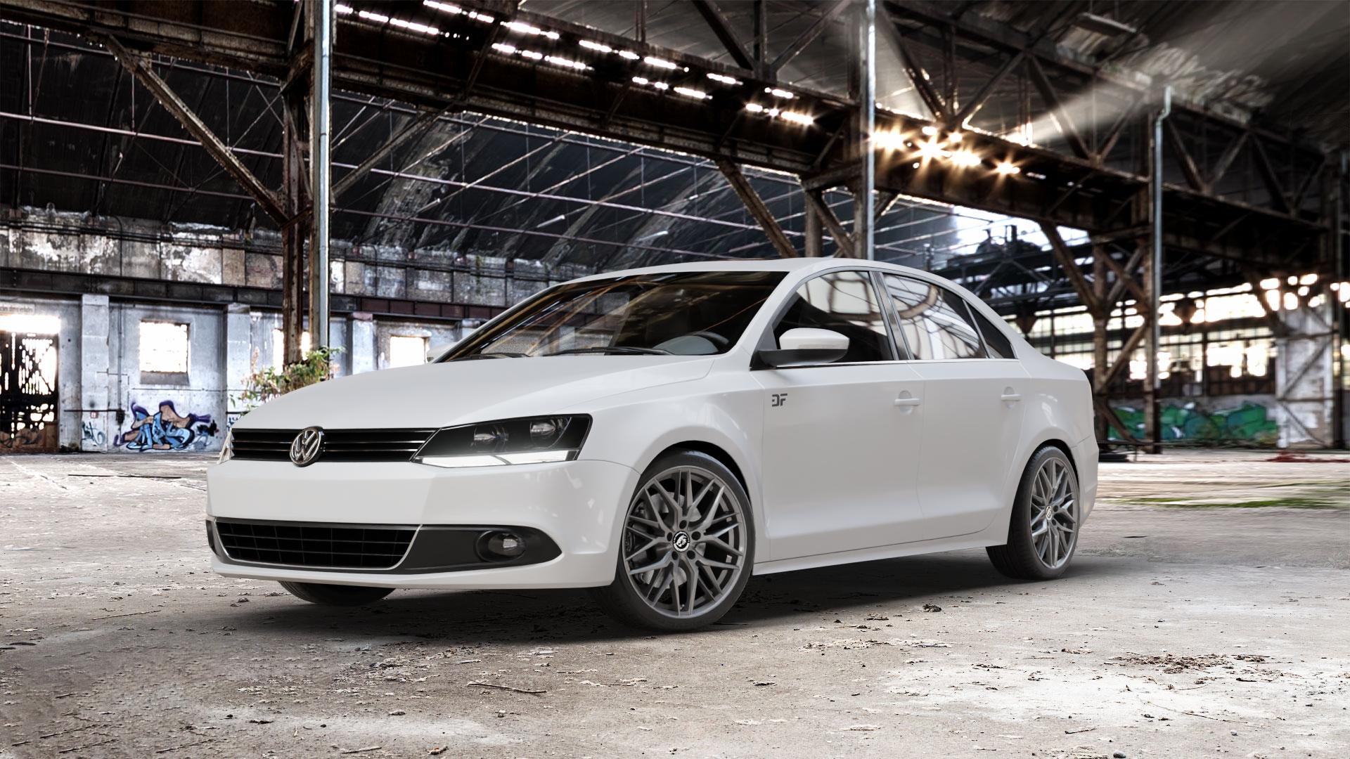 Damina Performance DM08 Anthrazit Felge mit Reifen grau in 18Zoll Winterfelge Alufelge auf weissem Volkswagen (VW) Jetta 6 Typ 16 Facelift ⬇️ mit 15mm Tieferlegung ⬇️ Old Industrial Hall_max_5300mm_2024 Frontansicht_1