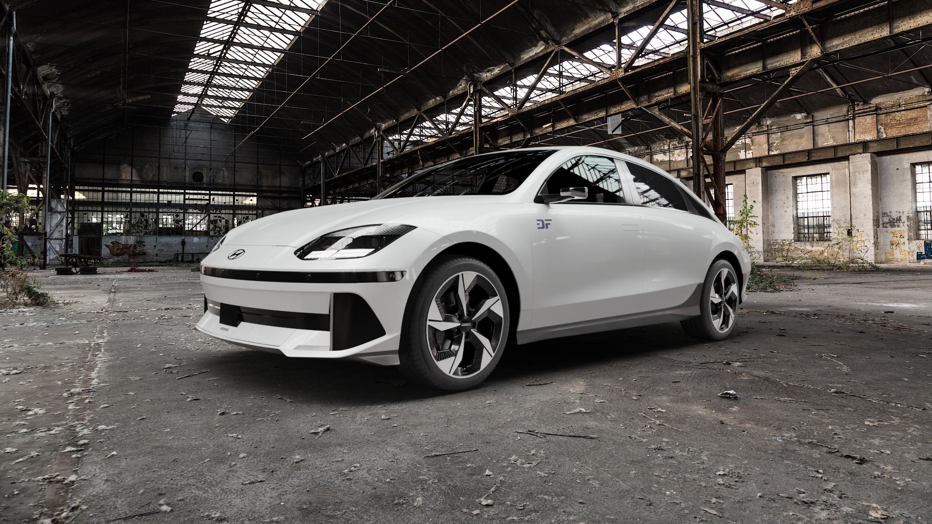 DEZENT AO BLACK/POLISHED Felge mit Reifen silber schwarz mehrfarbig in 19Zoll Winterfelge Alufelge auf weissem Hyundai Ioniq 6 Typ CE ⬇️ mit 15mm Tieferlegung ⬇️ Old Industrial Hall_max5000mm_2022 Frontansicht_1