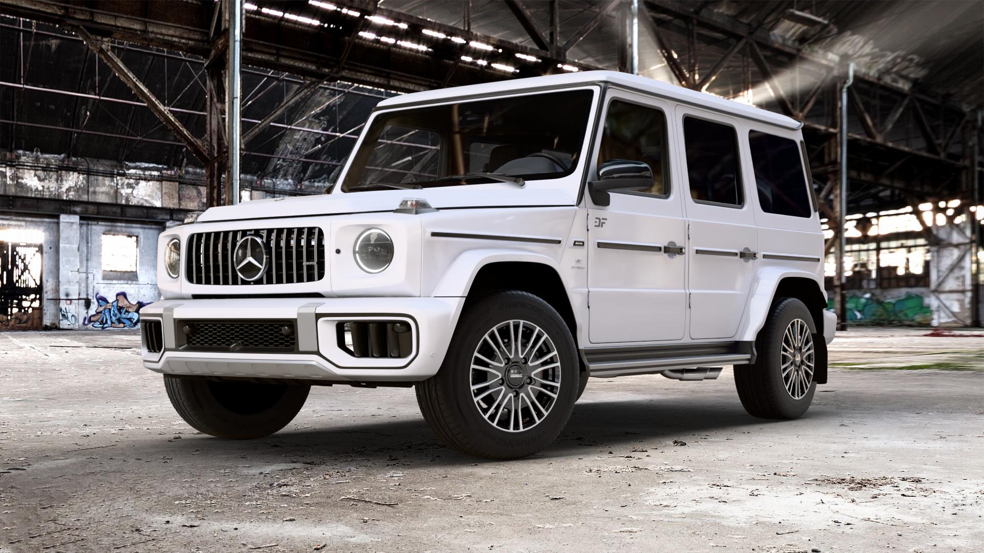 DEZENT KE BLACK/POLISHED Felge mit Reifen schwarz in 18Zoll Winterfelge Alufelge auf weissem Mercedes G-Klasse Typ W465 3,0l G 450d 270kW Mild-Hybrid (367 PS) 500 330kW (449 0,0l 580 EQ 223kW (303 4,0l 63 AMG 430kW (585 ⬇️ mit 15mm Tieferlegung ⬇️ Old Industrial Hall_max_5300mm_2024 Frontansicht_1