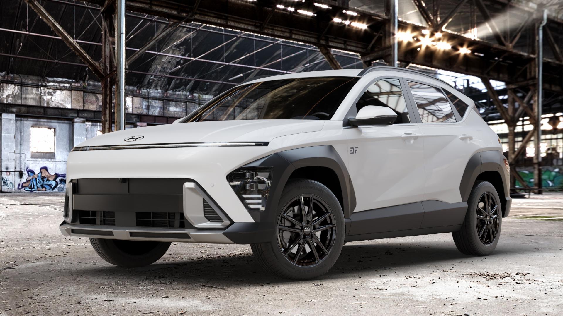DEZENT KF BLACK Felge mit Reifen schwarz in 17Zoll Winterfelge Alufelge auf weissem Hyundai Kona Typ SX2 ⬇️ mit 15mm Tieferlegung ⬇️ Old Industrial Hall_max_4400mm_2024 Frontansicht_1