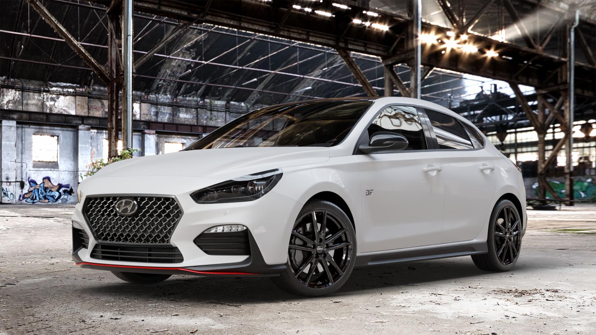 DEZENT KF BLACK Felge mit Reifen schwarz in 18Zoll Winterfelge Alufelge auf weissem Hyundai i30 Typ PDE Fastback ⬇️ mit 15mm Tieferlegung ⬇️ Old Industrial Hall_max_4400mm_2024 Frontansicht_1