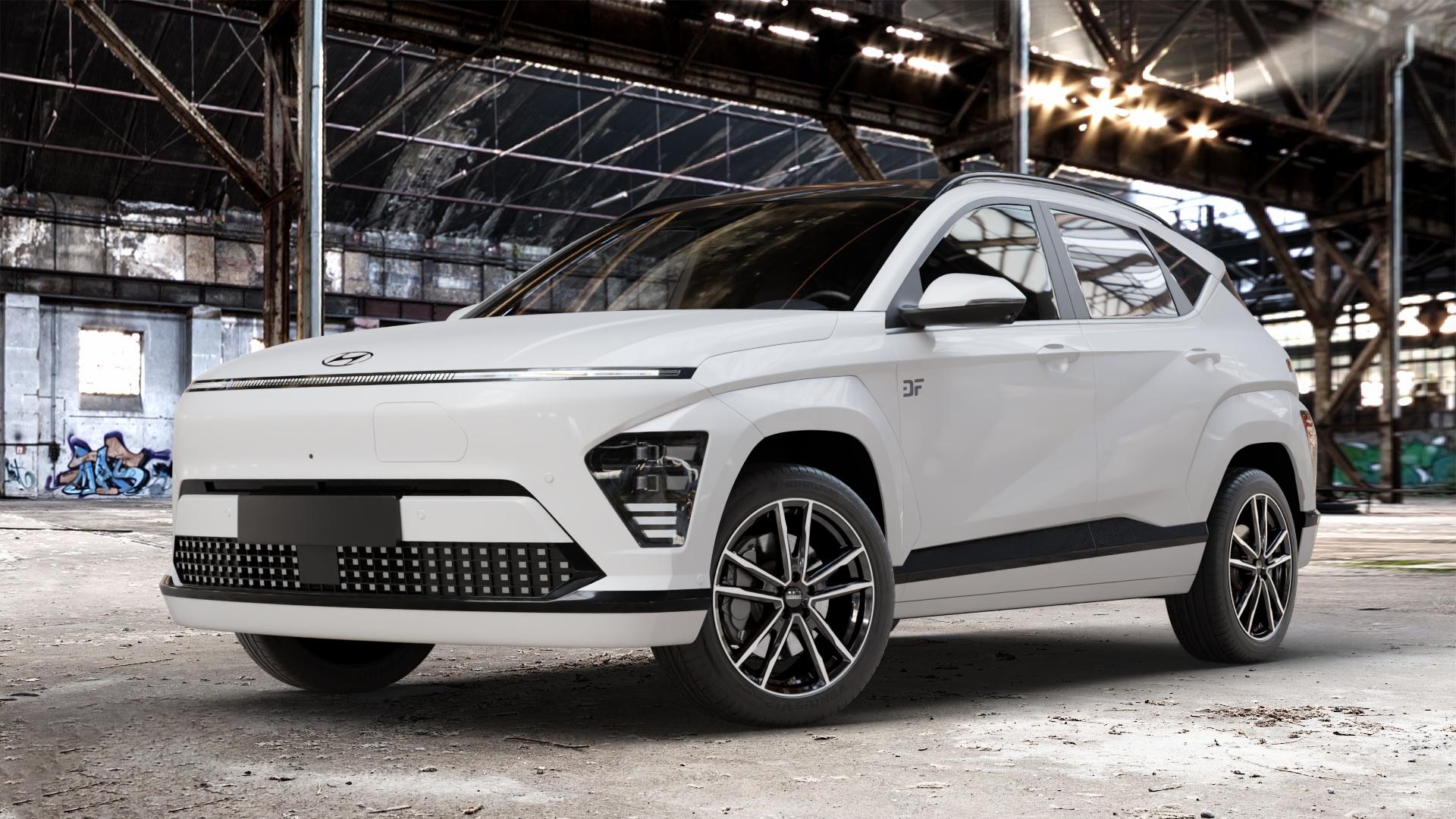DEZENT KF BLACK/POLISHED Felge mit Reifen silber schwarz in 18Zoll Winterfelge Alufelge auf weissem Hyundai Kona Elektro Typ SX2E ⬇️ mit 15mm Tieferlegung ⬇️ Old Industrial Hall_max_4400mm_2024 Frontansicht_1