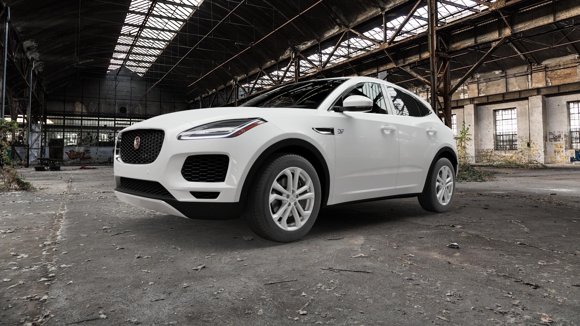 DEZENT TA SILVER Felge mit Reifen silber in 18Zoll Winterfelge Alufelge auf weissem Jaguar E-Pace Typ DF ⬇️ mit 15mm Tieferlegung ⬇️ Old Industrial Hall_max5000mm_2022 Frontansicht_1